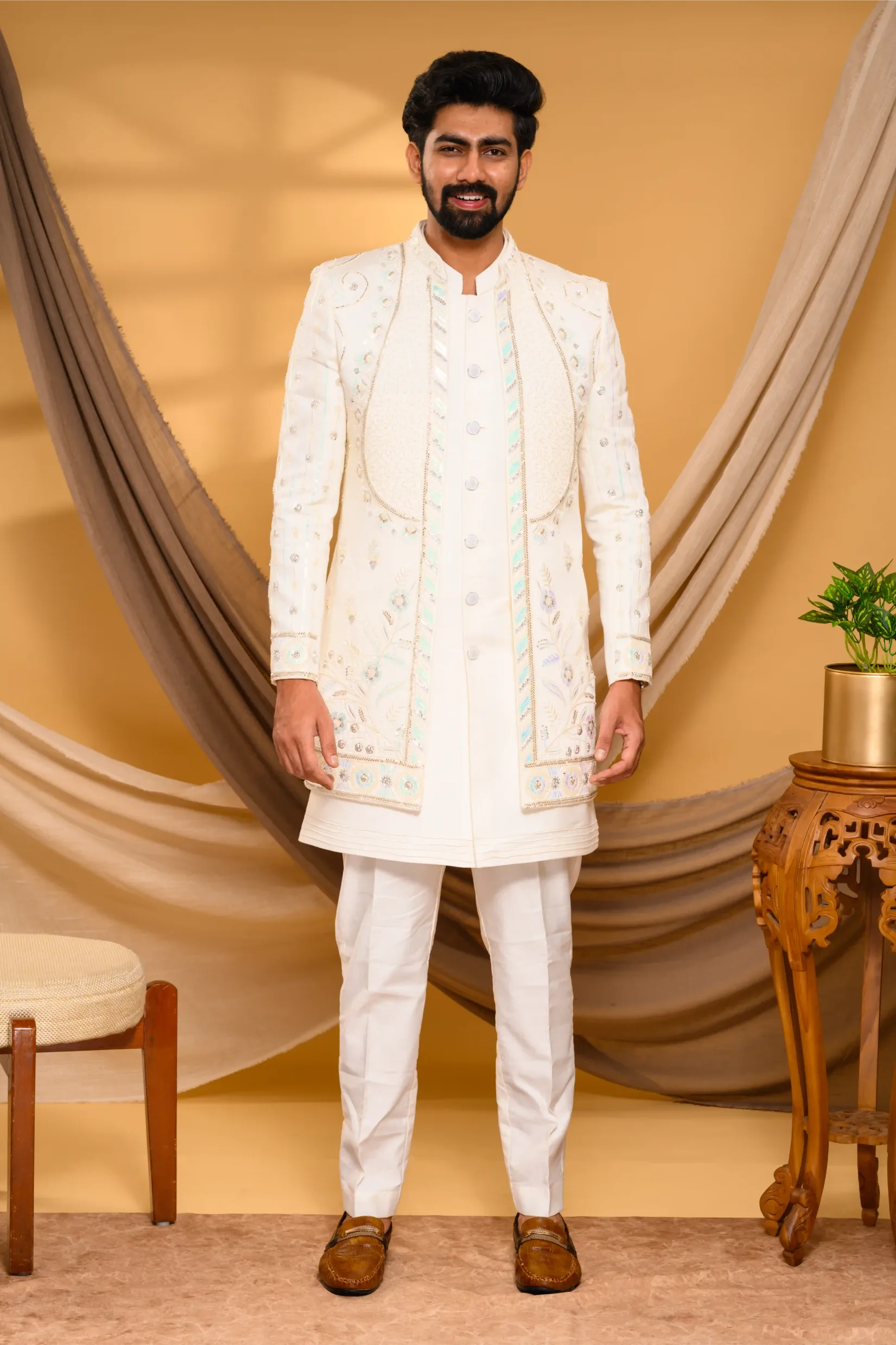Ivory Shade Open Indo Western Slim Jacket with floral hand embroidery & surface embroidery paired with Kurta & Narrow Pants (Set of 3)