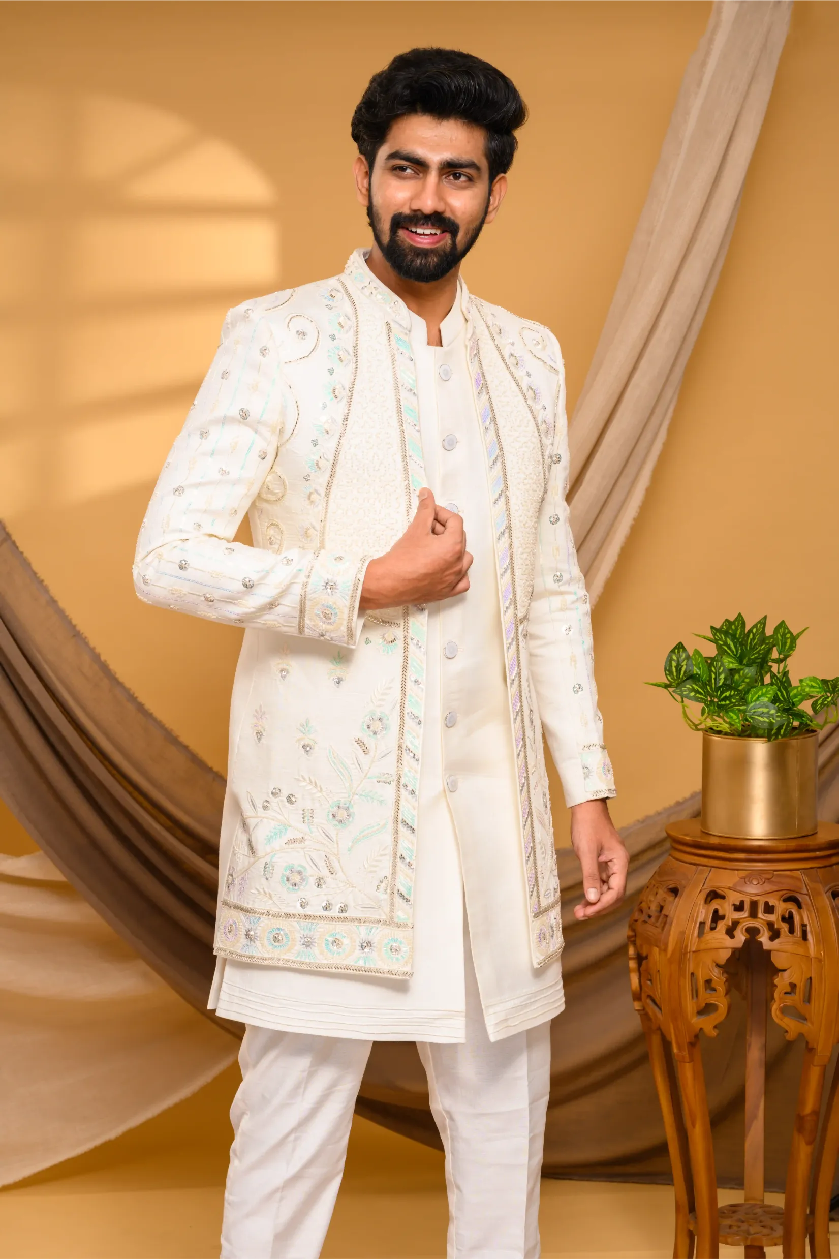 Ivory Shade Open Indo Western Slim Jacket with floral hand embroidery & surface embroidery paired with Kurta & Narrow Pants (Set of 3)