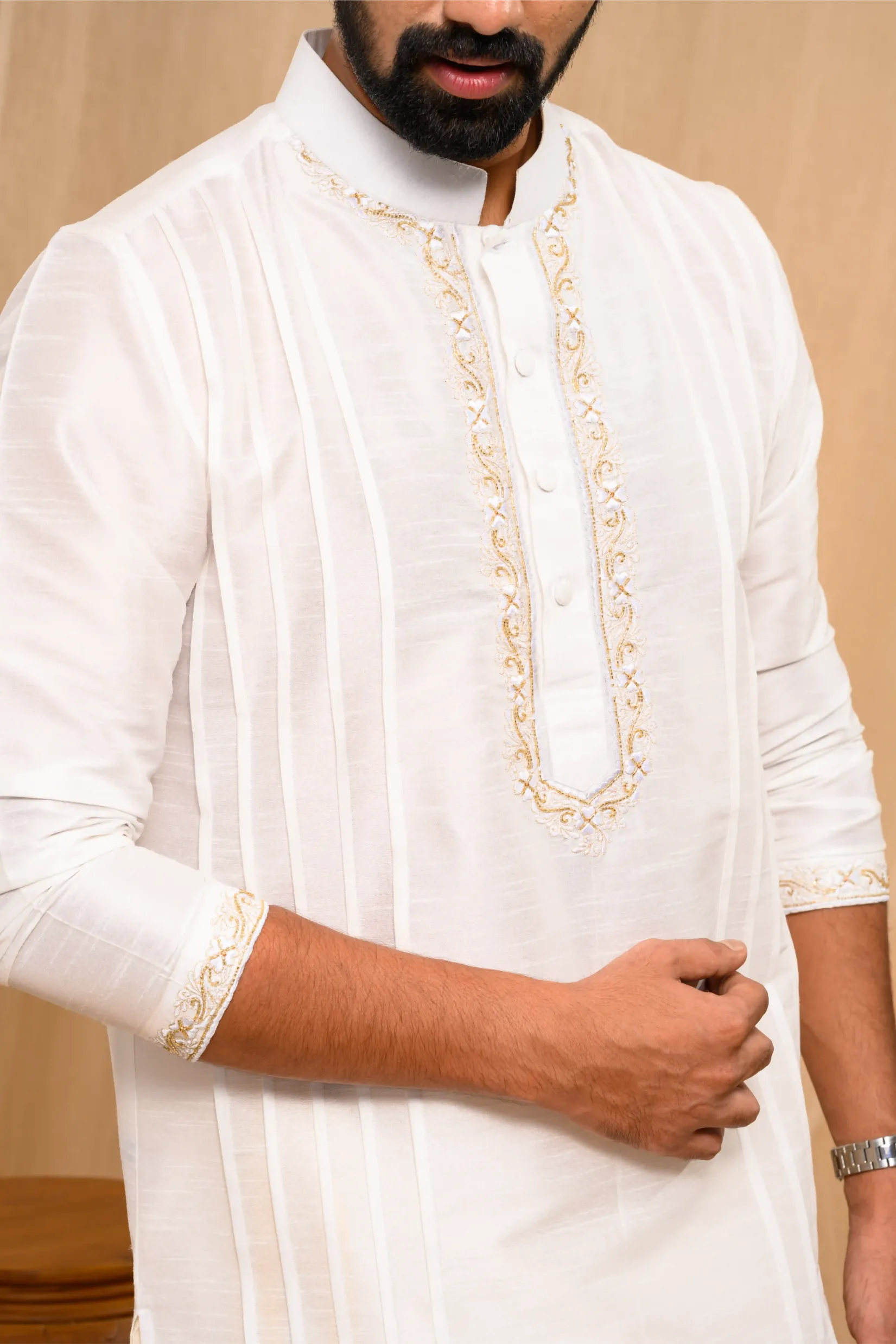 Off- White Silk Kurta with Hand Embroidery detailing on placket, neck border & sleeve edge (Kurta Only)