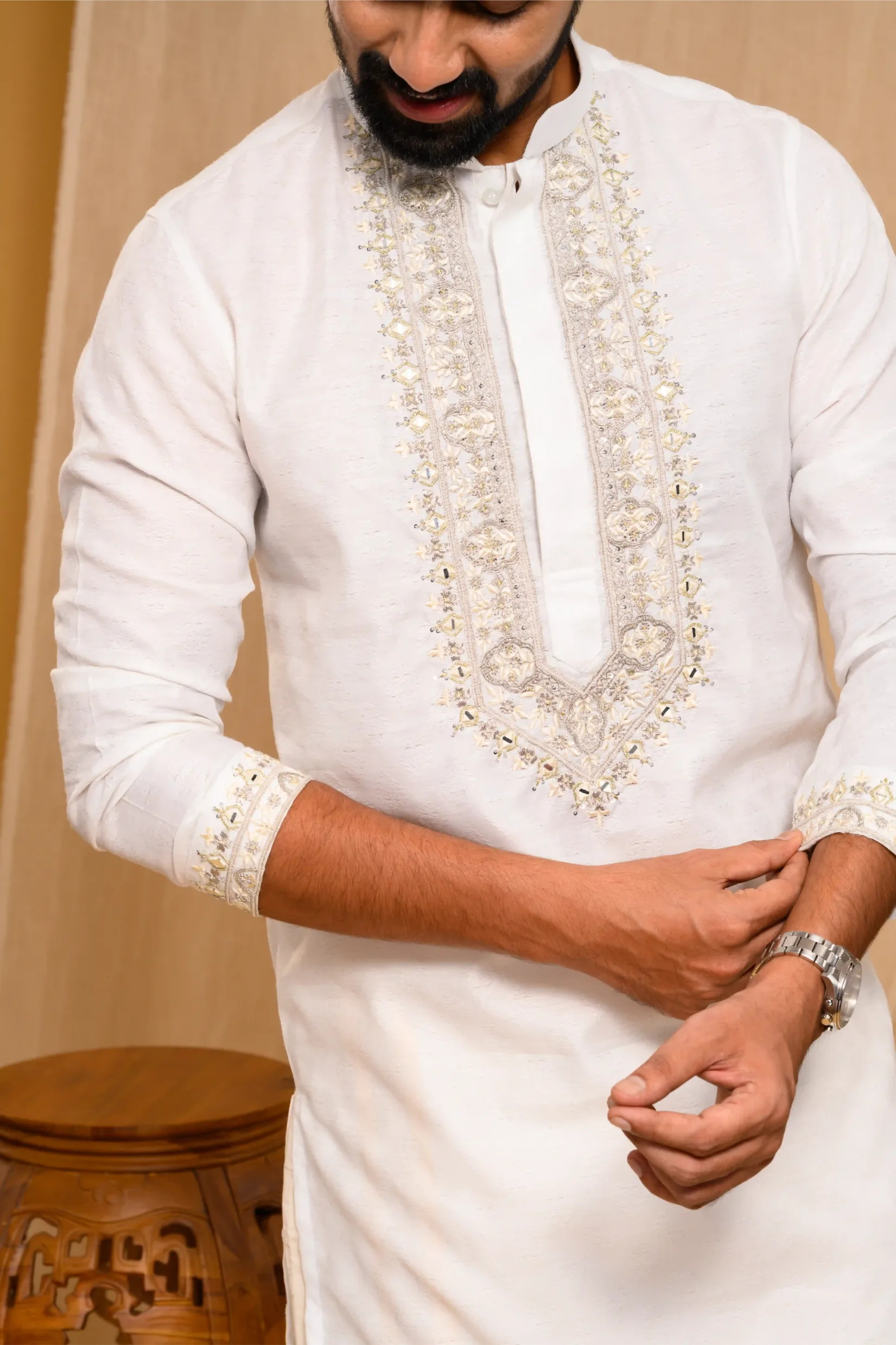 Off- White Silk Kurta with Heavy Hand Embroidery detailing on placket & sleeve edge (Kurta Only)