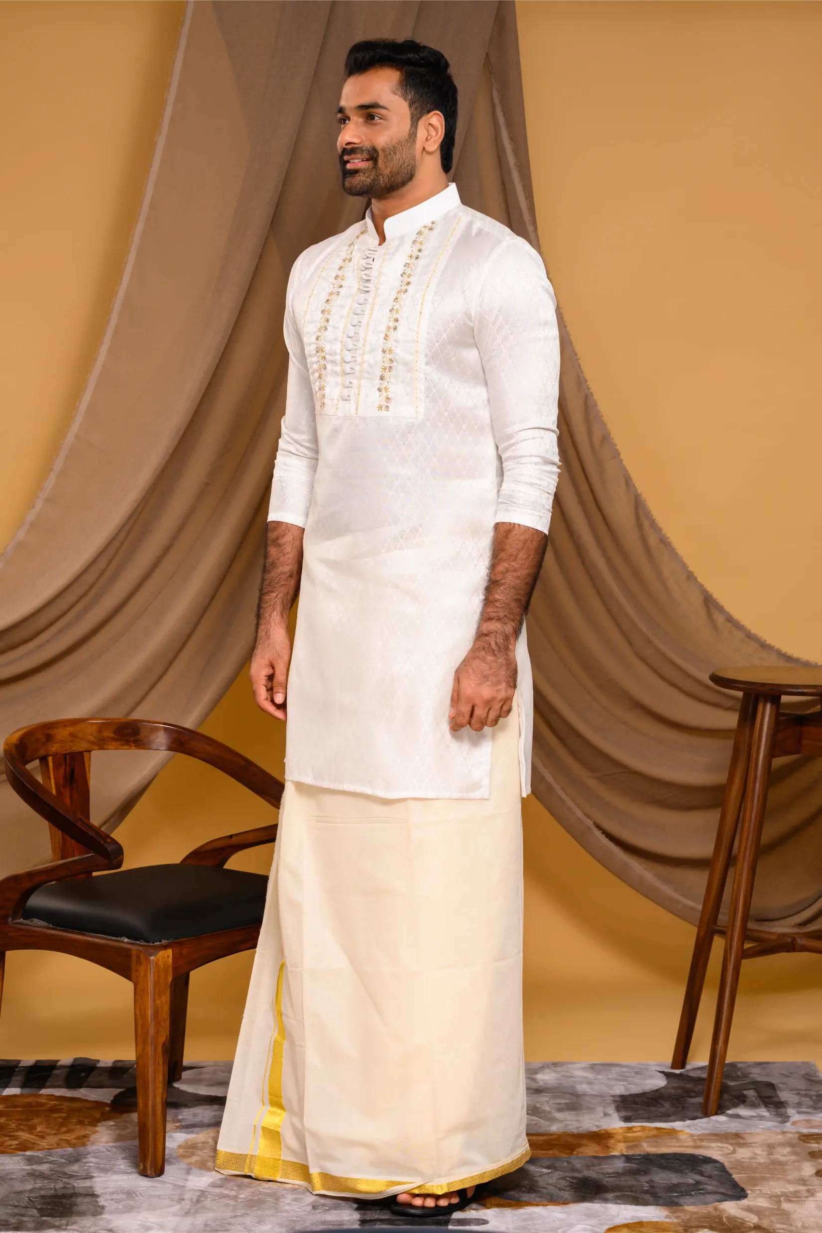 Ivory Silk Brocade Kurta with Heavy Golden Handwork detailing on wide Placket Border(Kurta Only)