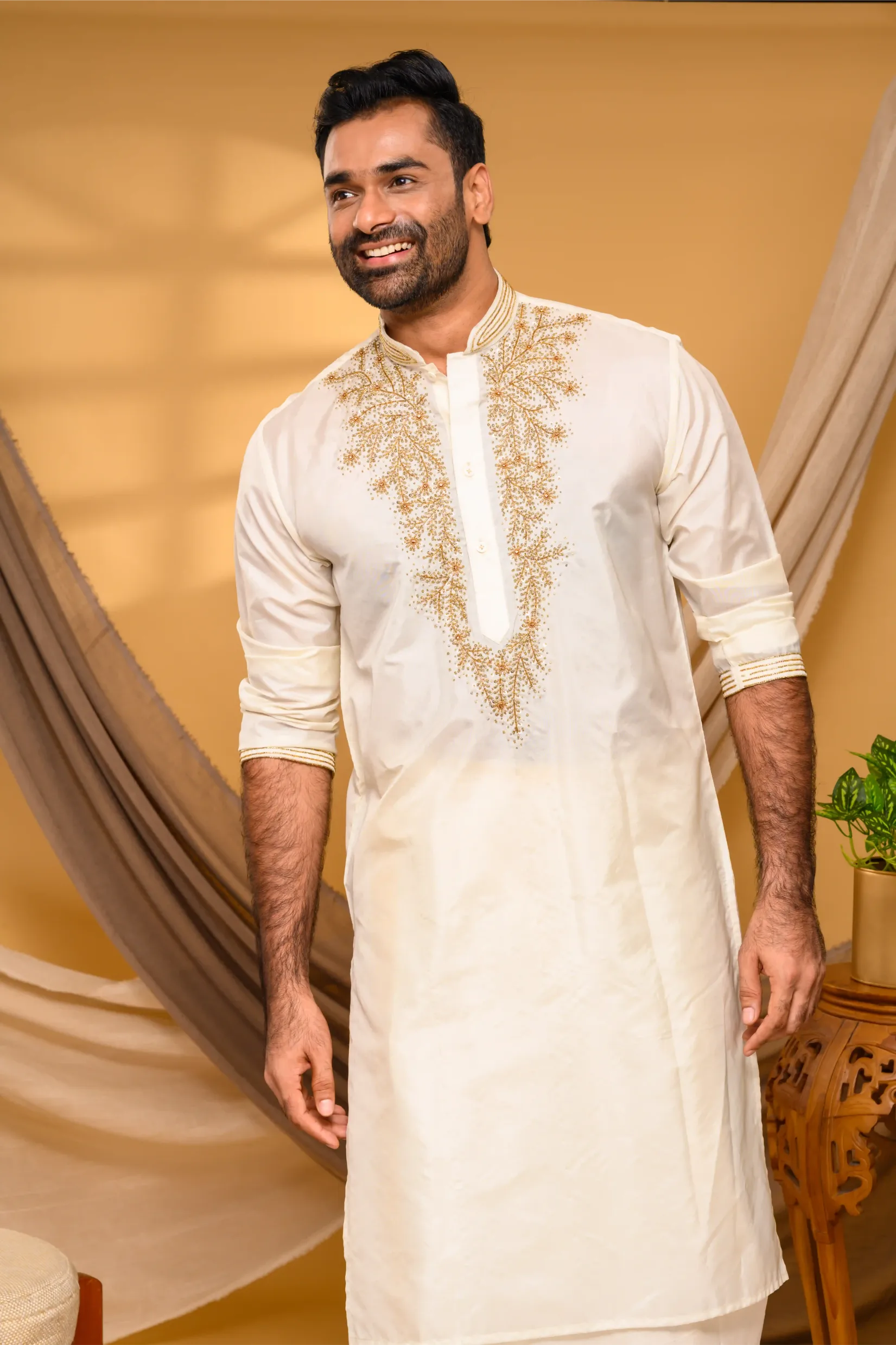 Ivory Silk Kurta with Heavy Hand Embroidery detailing on Chest - Zari Detailing on Neck & Sleeve Edge (Kurta + Munde +Melmunde)