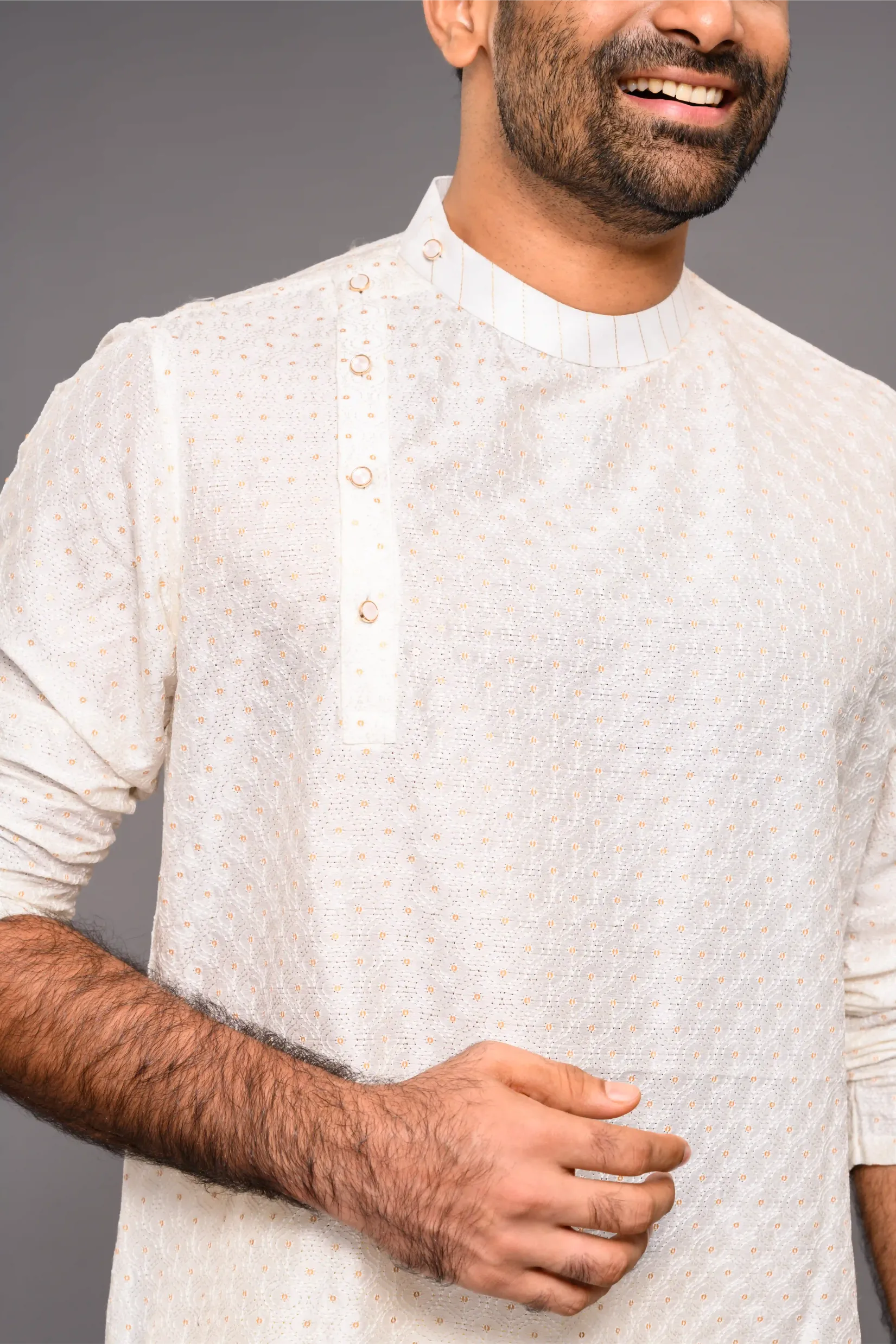 Classic Ivory Silk Kurta with side open closure opening with surface fabric embroidery (Kurta + Munde)
