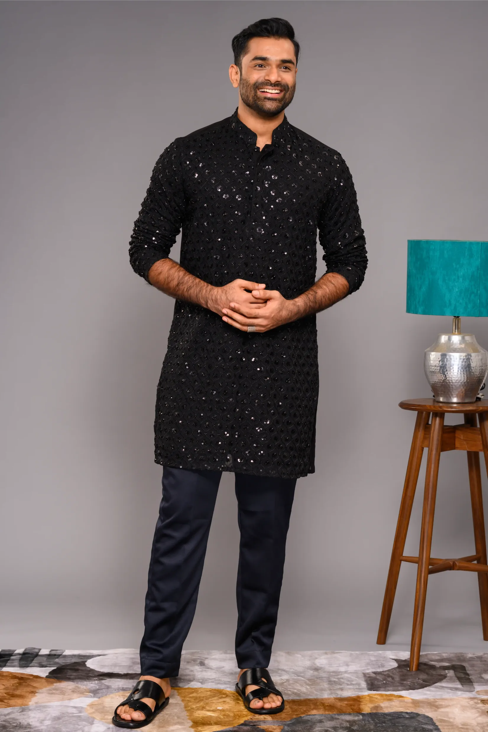 Designer Black Kurta with Glossy Self Surface Embroidery paired with Narrow Pants (Kurta Only)