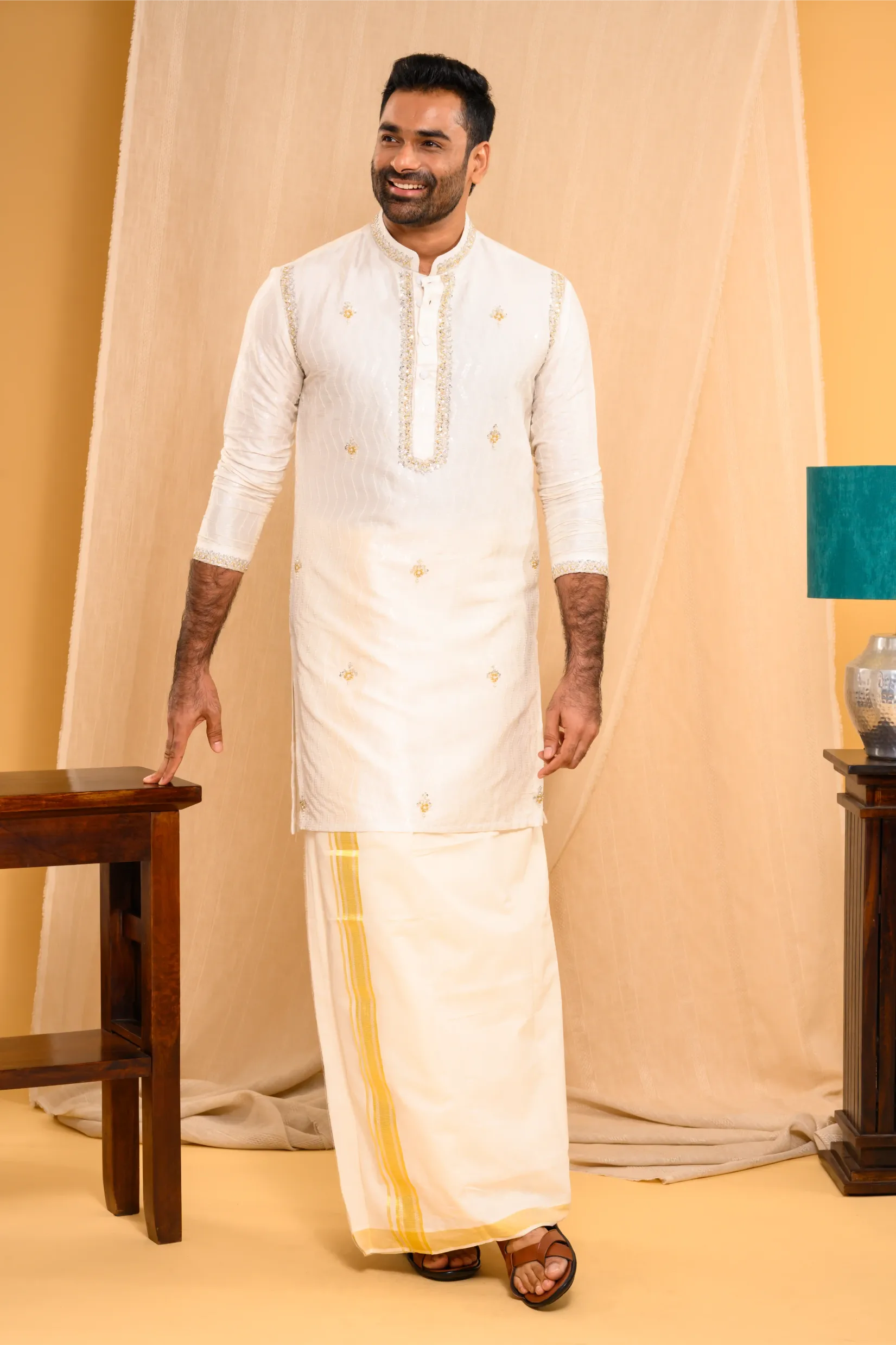 Ivory Silk Kurta with floral embroidery detailing on Shoulder Lines, Sleeves Edge & Neck (Kurta Only)