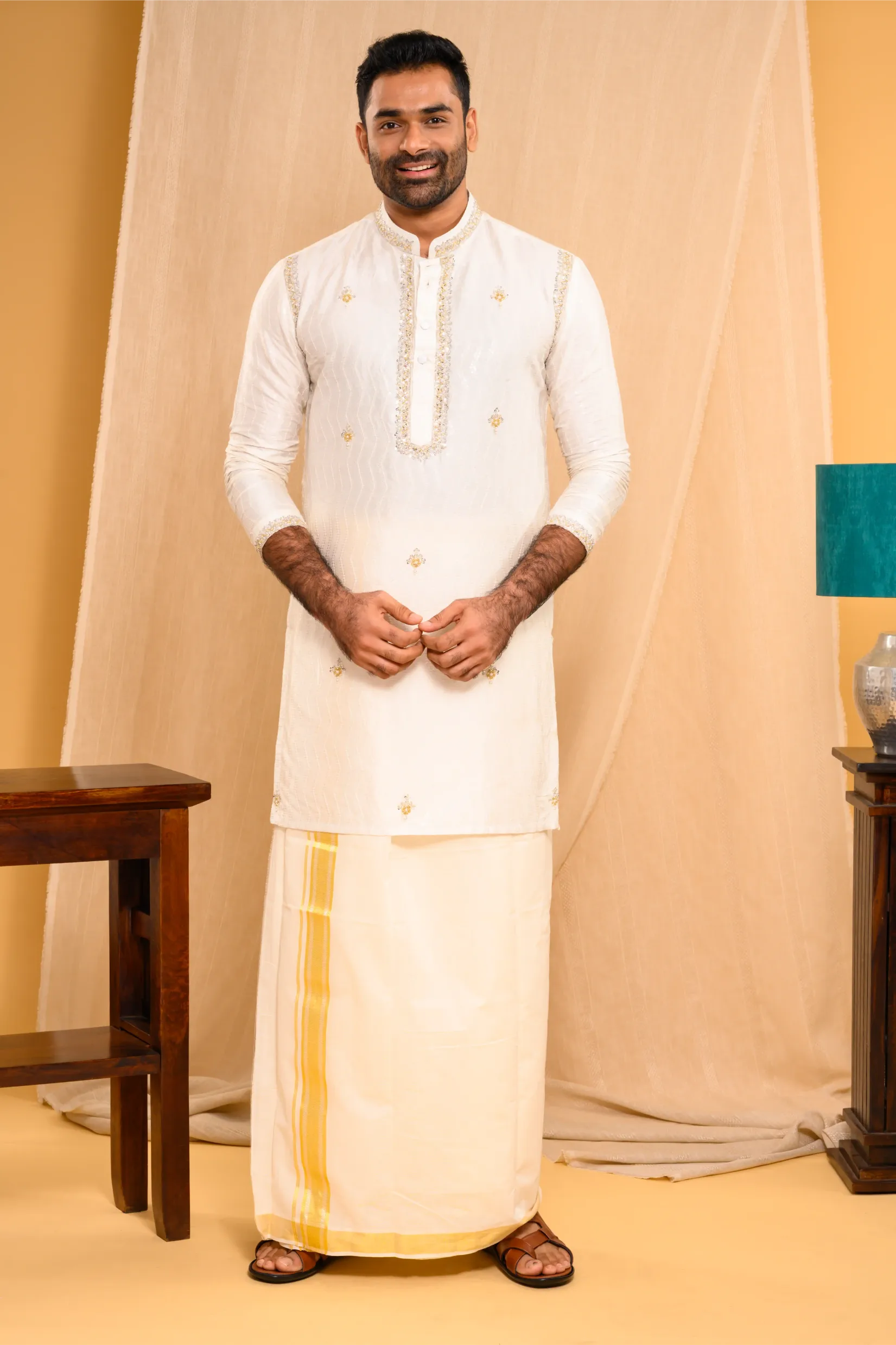 Ivory Silk Kurta with floral embroidery detailing on Shoulder Lines, Sleeves Edge & Neck (Kurta Only)
