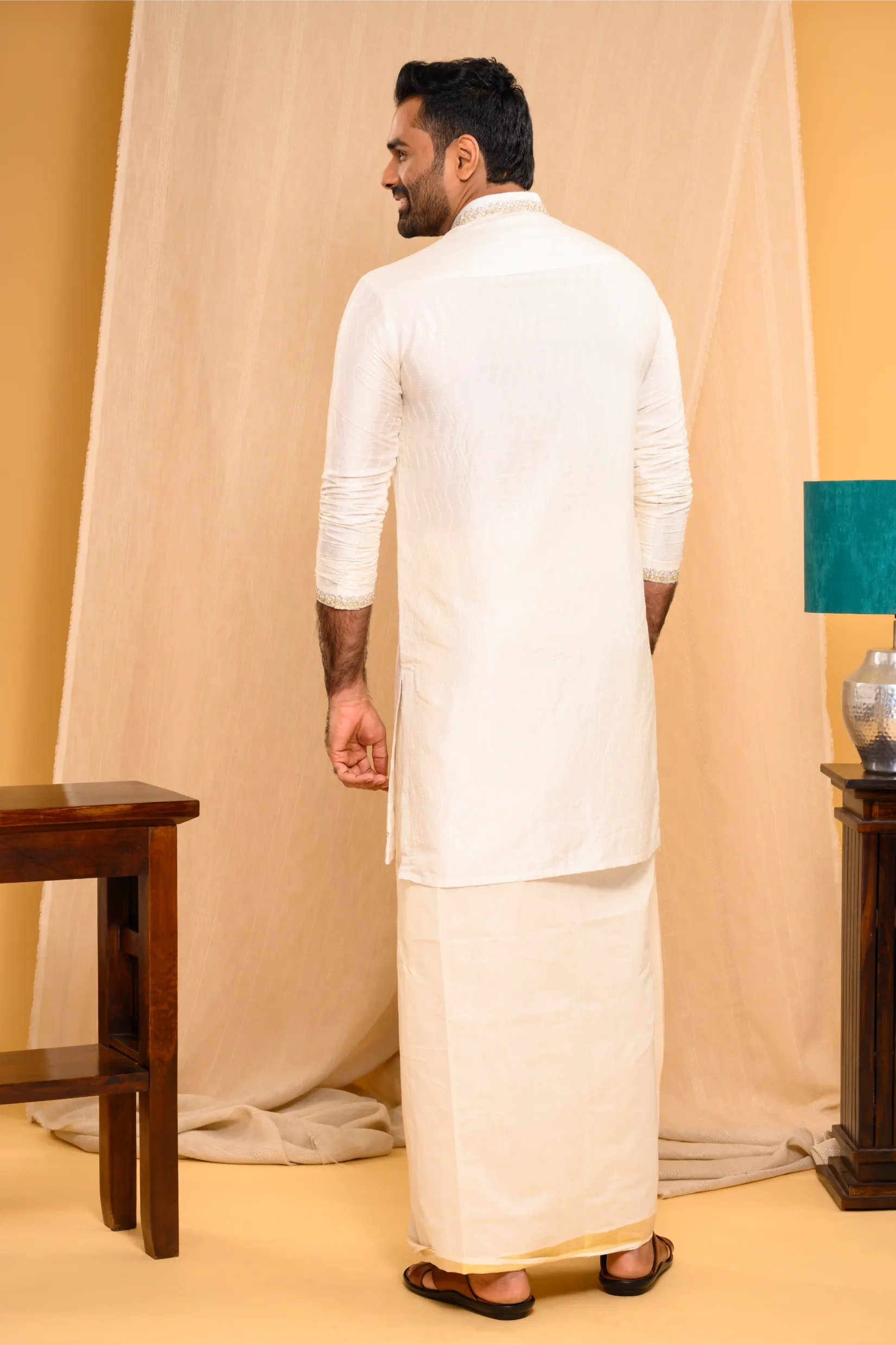 Ivory Silk Kurta with floral embroidery detailing on Shoulder Lines, Sleeves Edge & Neck (Kurta Only)