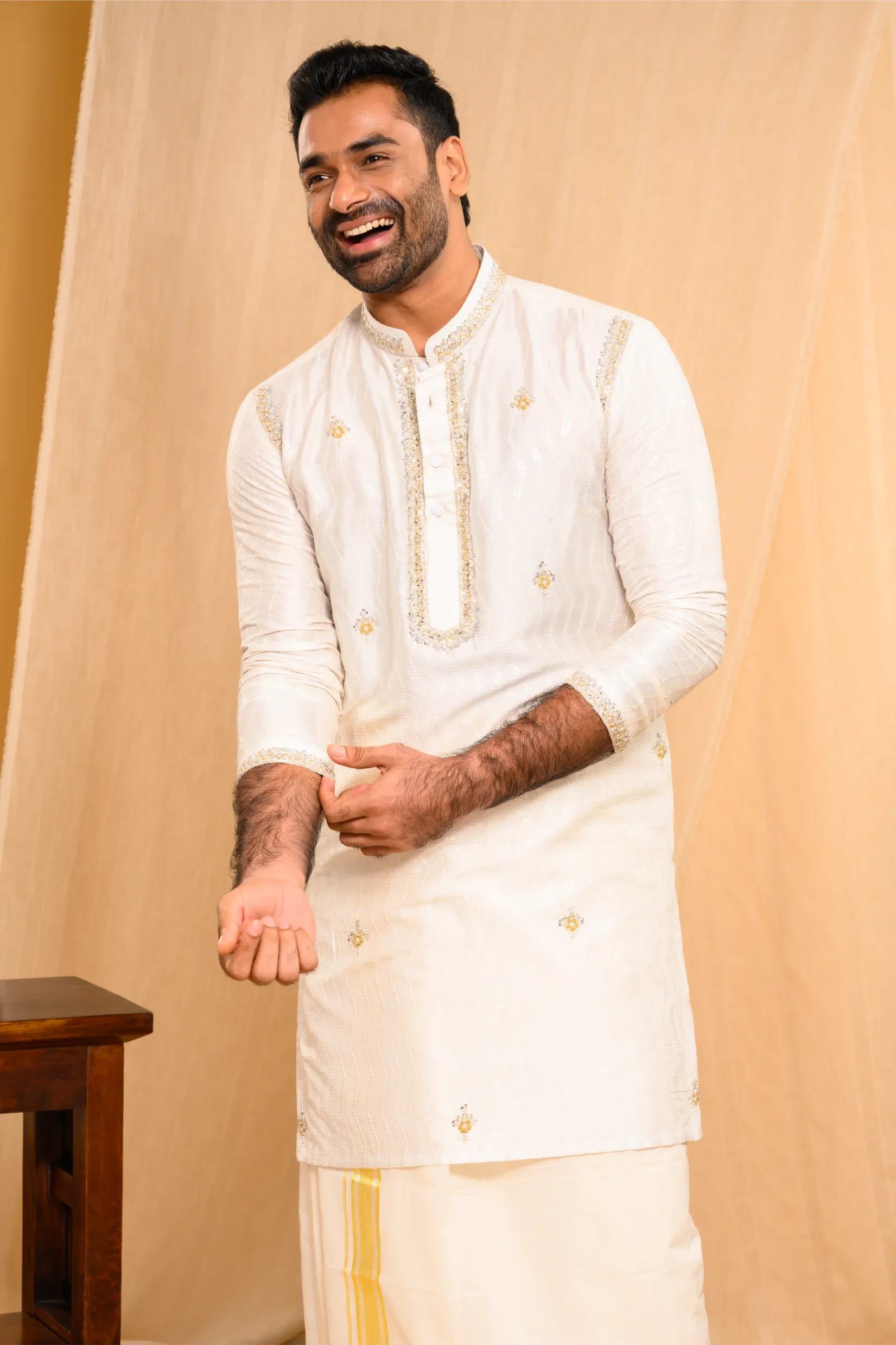 Ivory Silk Kurta with floral embroidery detailing on Shoulder Lines, Sleeves Edge & Neck (Kurta Only)