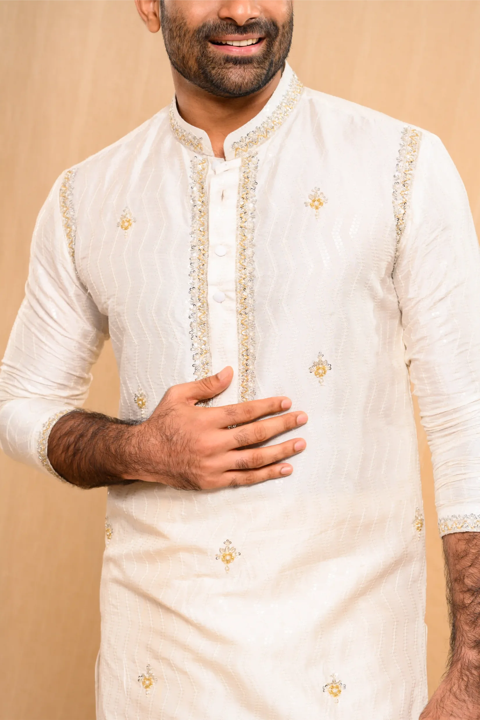 Ivory Silk Kurta with floral embroidery detailing on Shoulder Lines, Sleeves Edge & Neck (Kurta Only)