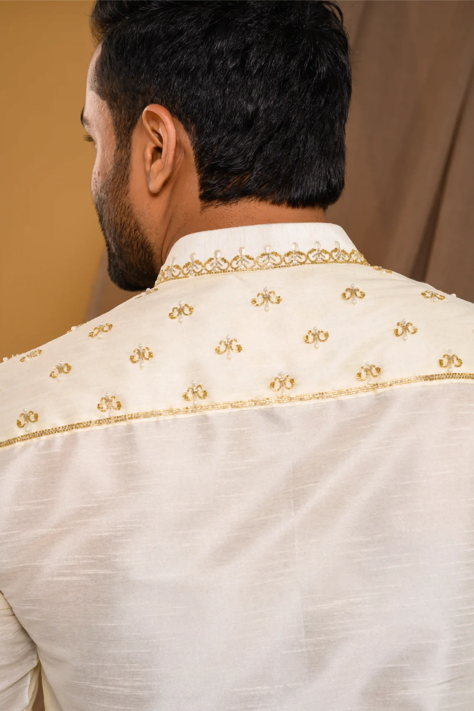 Ivory Silk Kurta with Light Hand Embroidery detailing on placket, sleeve edge & Neck (Kurta Only)