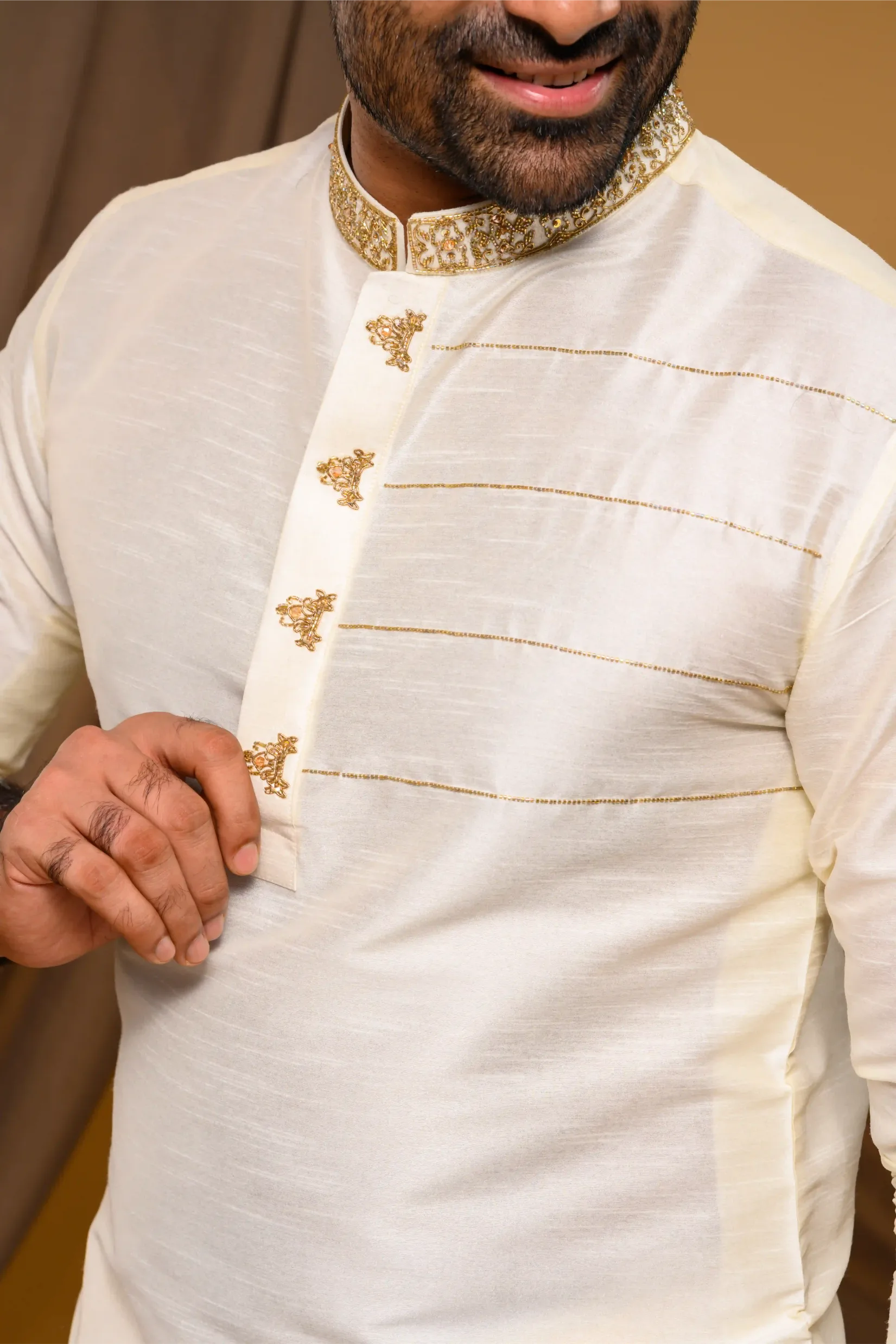 Ivory Silk Kurta with Hand Embroidery detailing on Neck & Zari Detailing on Chest (Kurta Only)