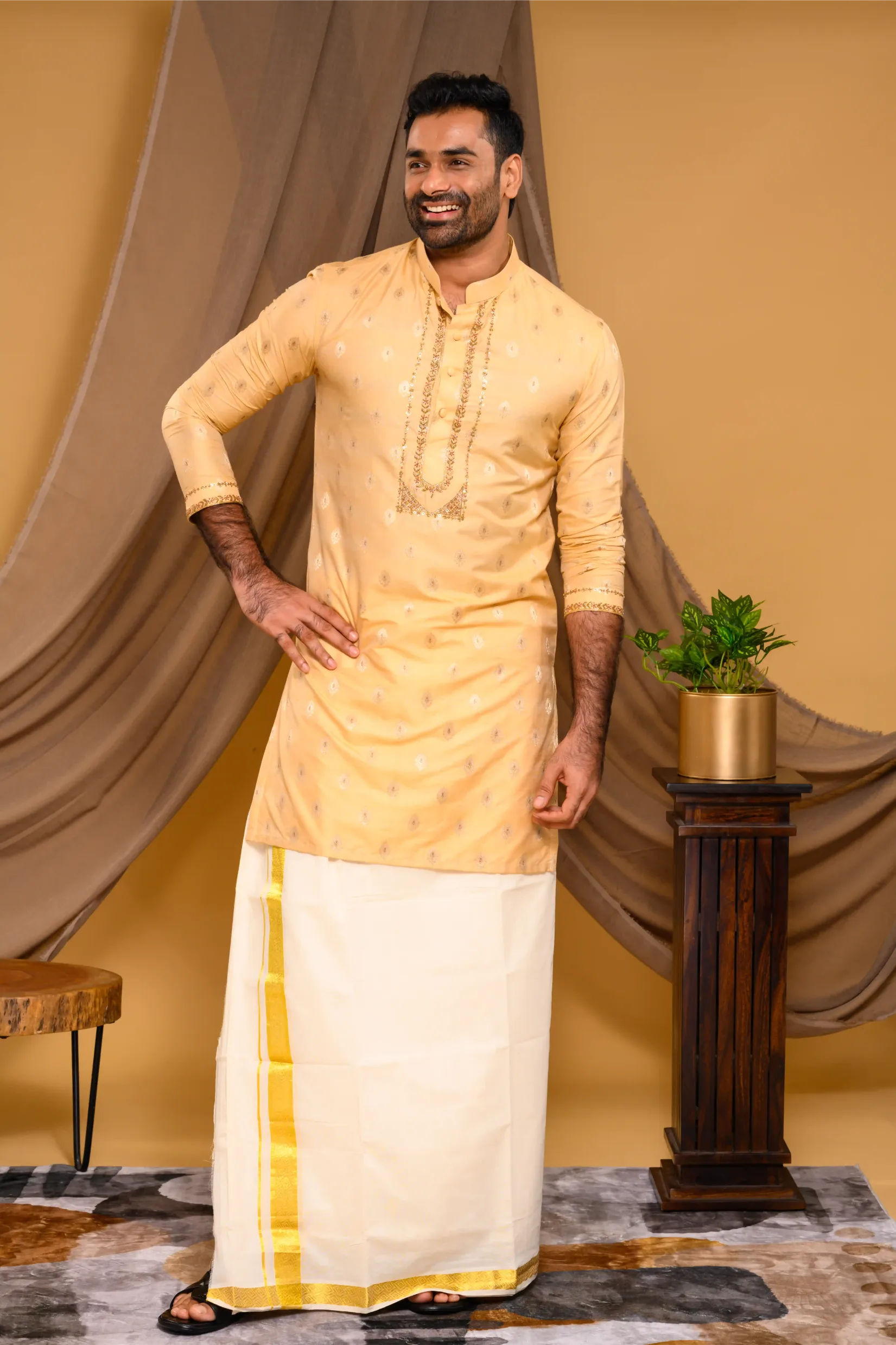 Golden Silk Brocade Kurta with Heavy Golden Handwork detailing on wide placket border & sleeve edge (Kurta + Munde)