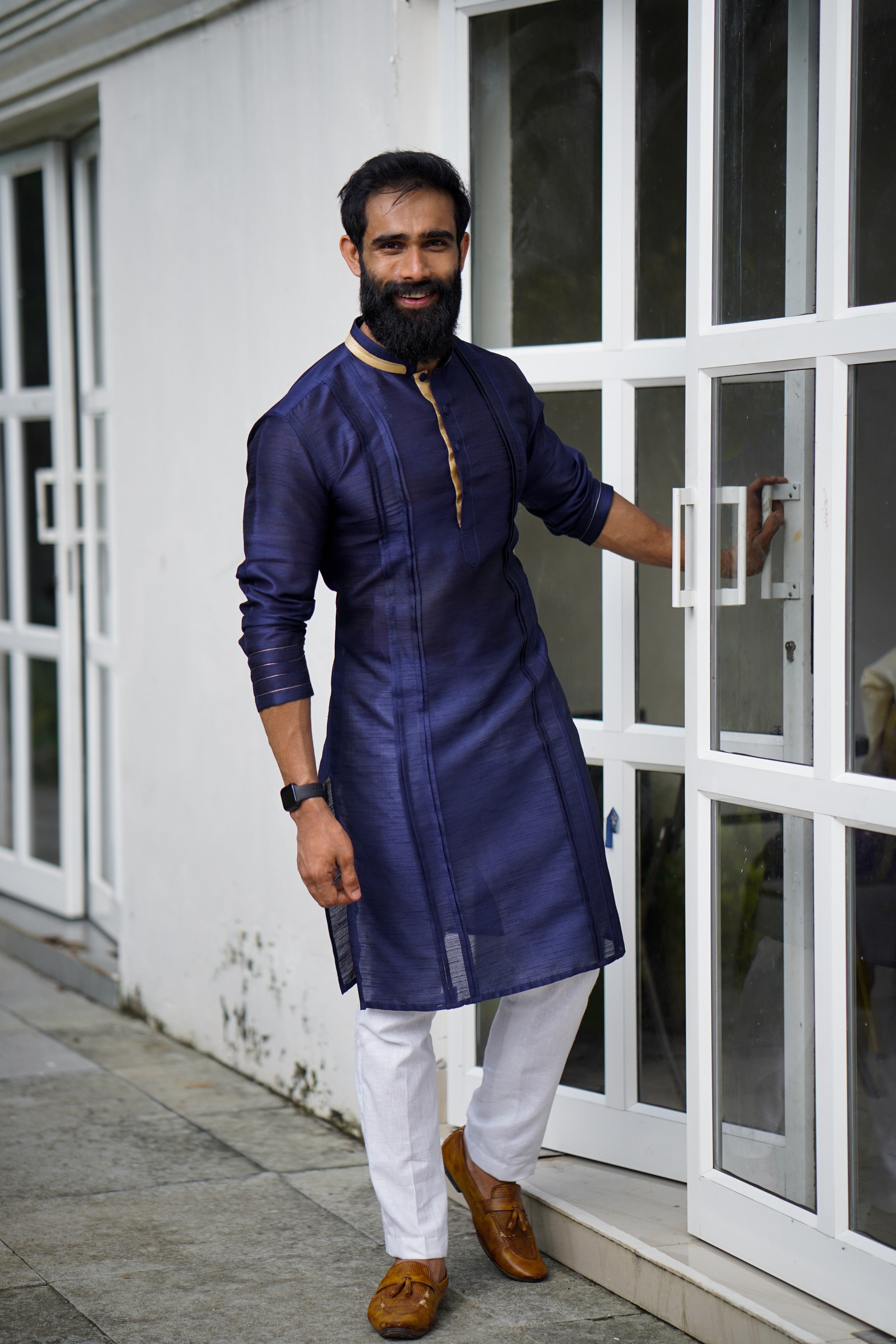 Navy Blue Pleated Kurta Set with Golden Detailing  (Kurta + White Bottom Pants)