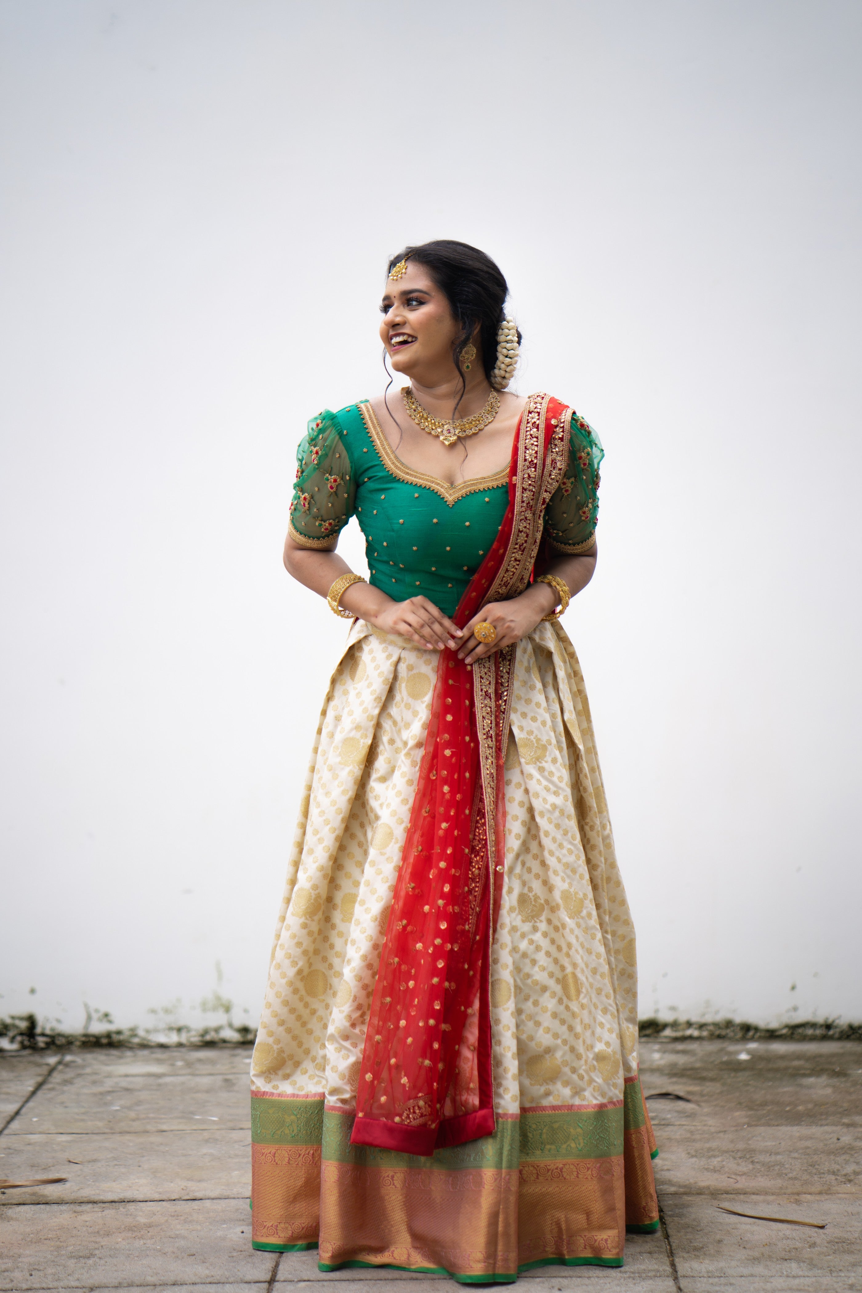 Cadmium Green/ Beige Traditional Lehenga Detailed Red & Gold hand Embroidery