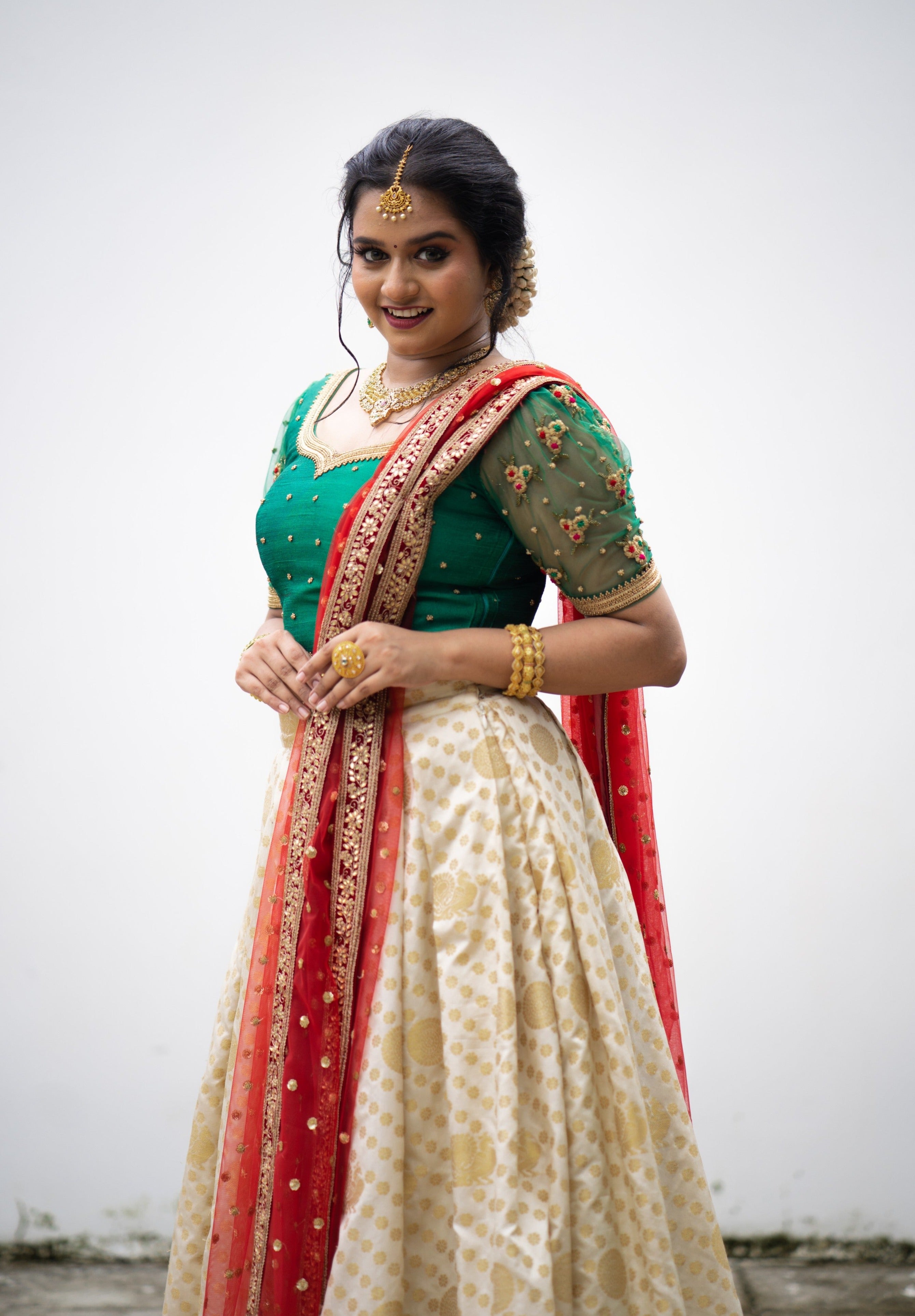 Cadmium Green/ Beige Traditional Lehenga Detailed Red & Gold hand Embroidery