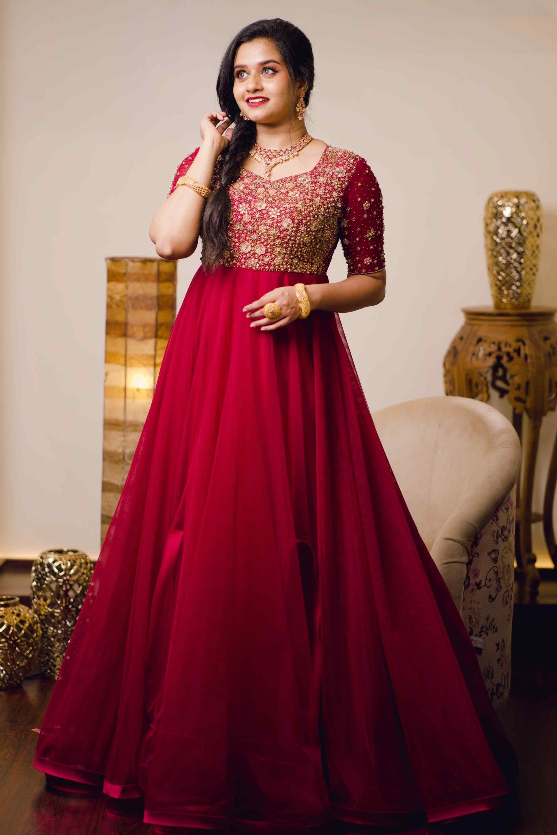 Amaranth Red Layered Gown Detailed With Golden Handwork Embroidery