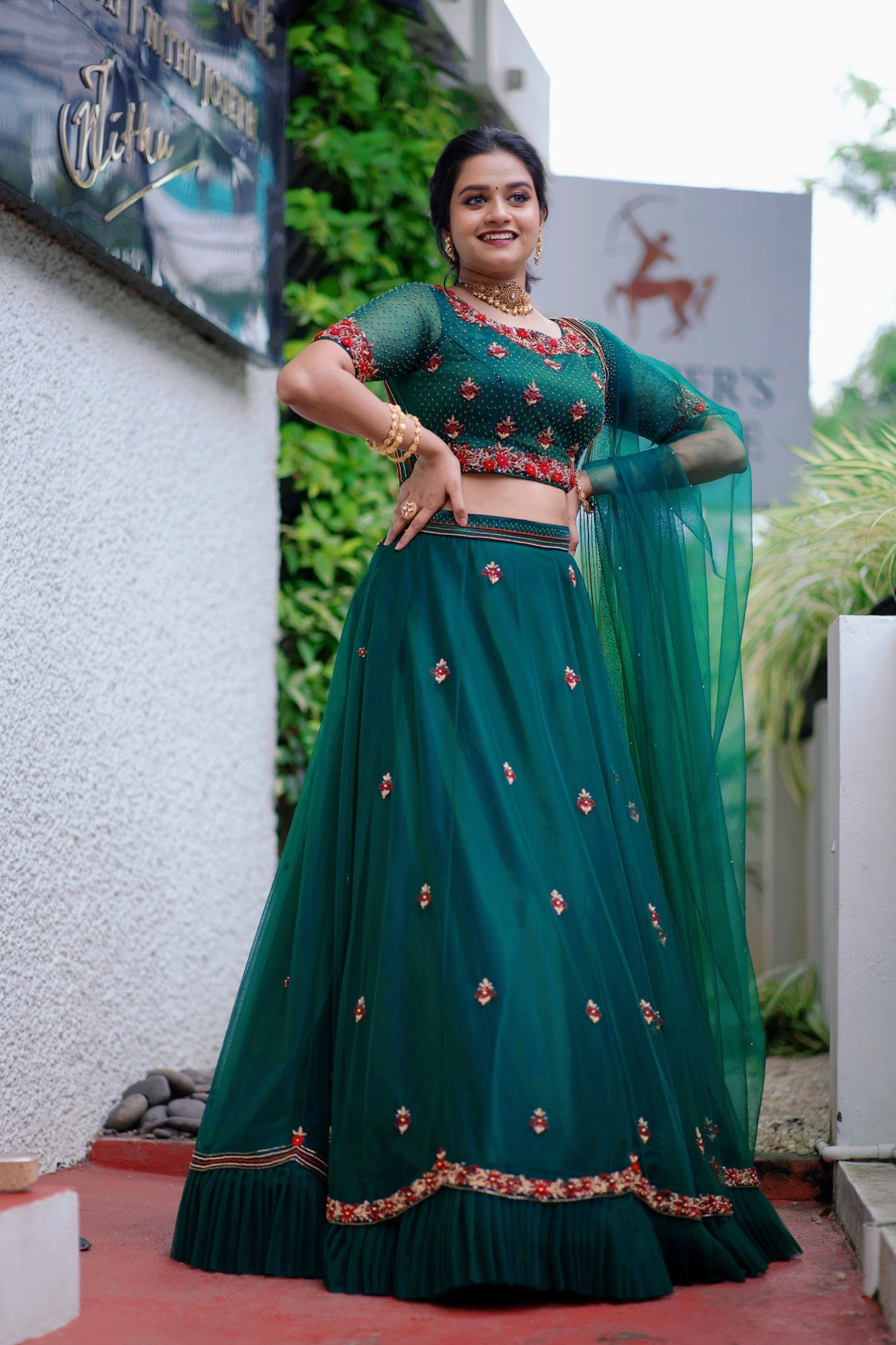 Pine Green Lehenga Detailed with Contrast Red French Knots & Golden Embroidery