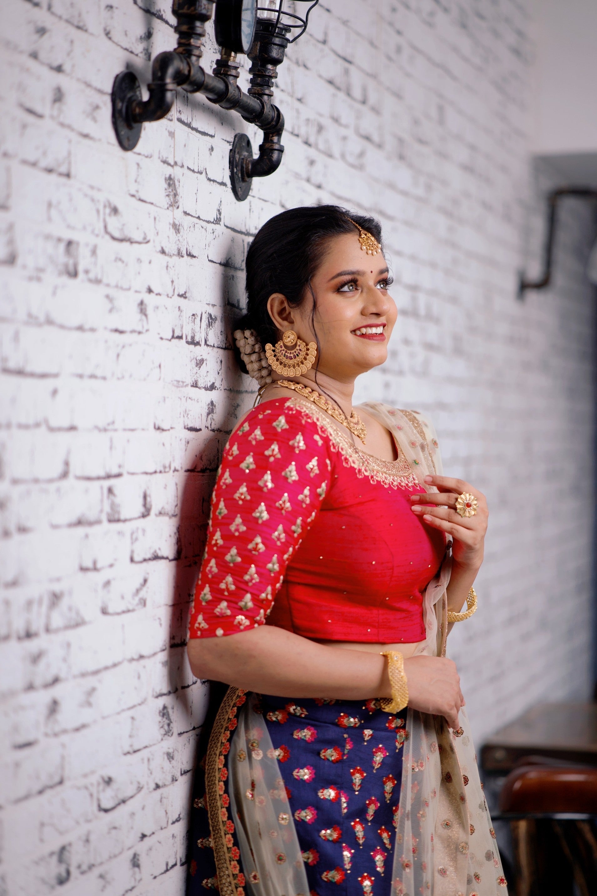 Red/ Blue Traditional Lehenga detailed with Golden Hand Embroidery