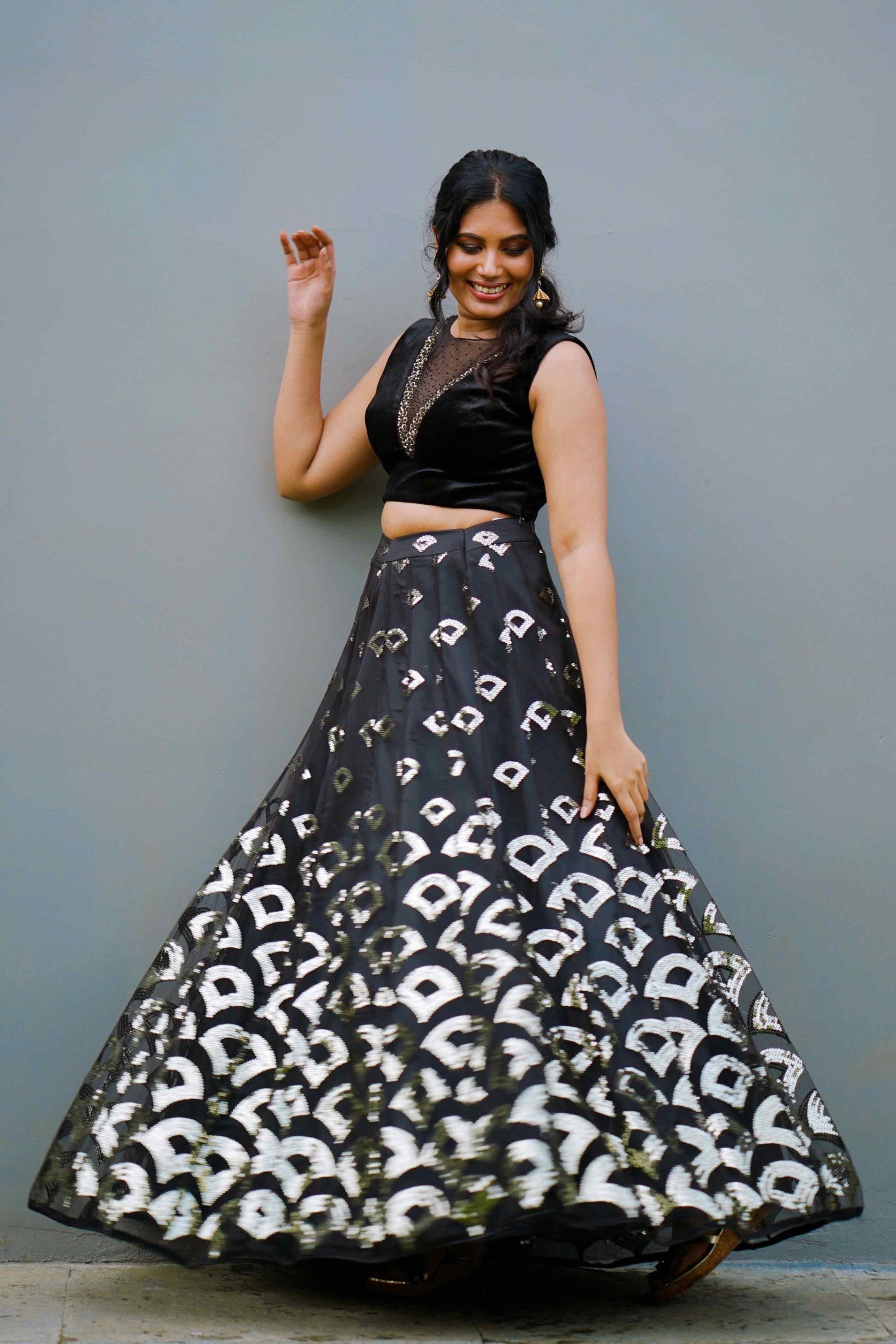 Jet Black Sleeveless Lehenga Detailed with White Gold Sequence Work