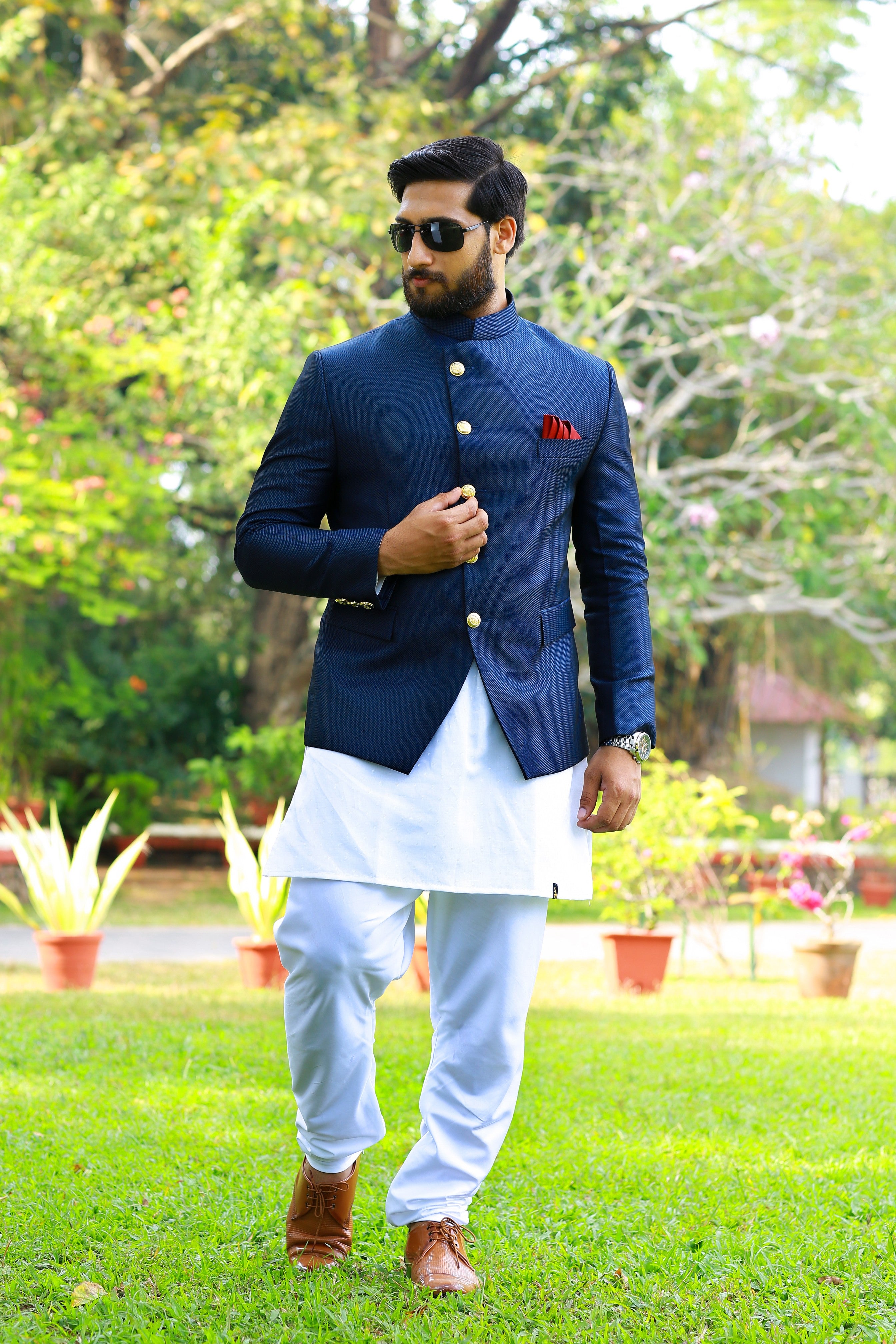 Midnight Blue Indo Western Bandhgala Suit With Thread Handwork Detailing paired with White Kurta &  White Narrow Pants (Set of 3)