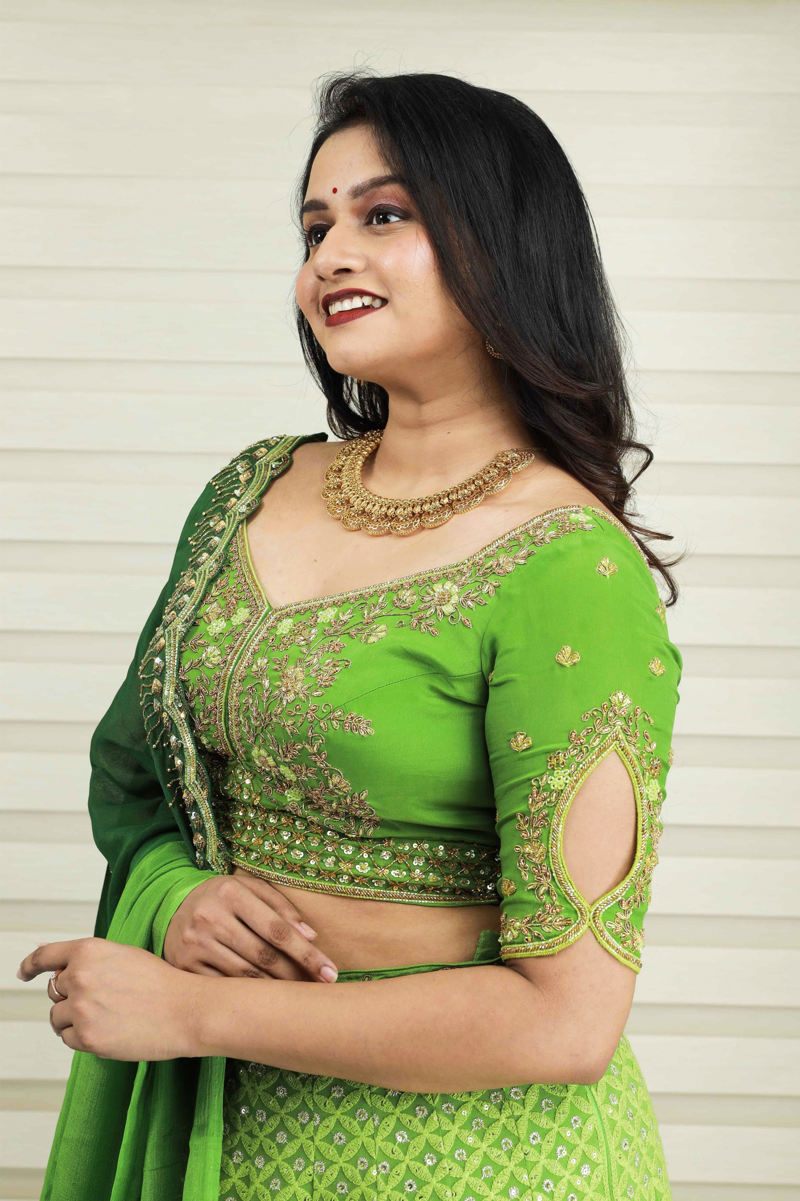 Sheen Green Bridal Lehenga detalied in Golden Zardozi Handwork & Thread Work