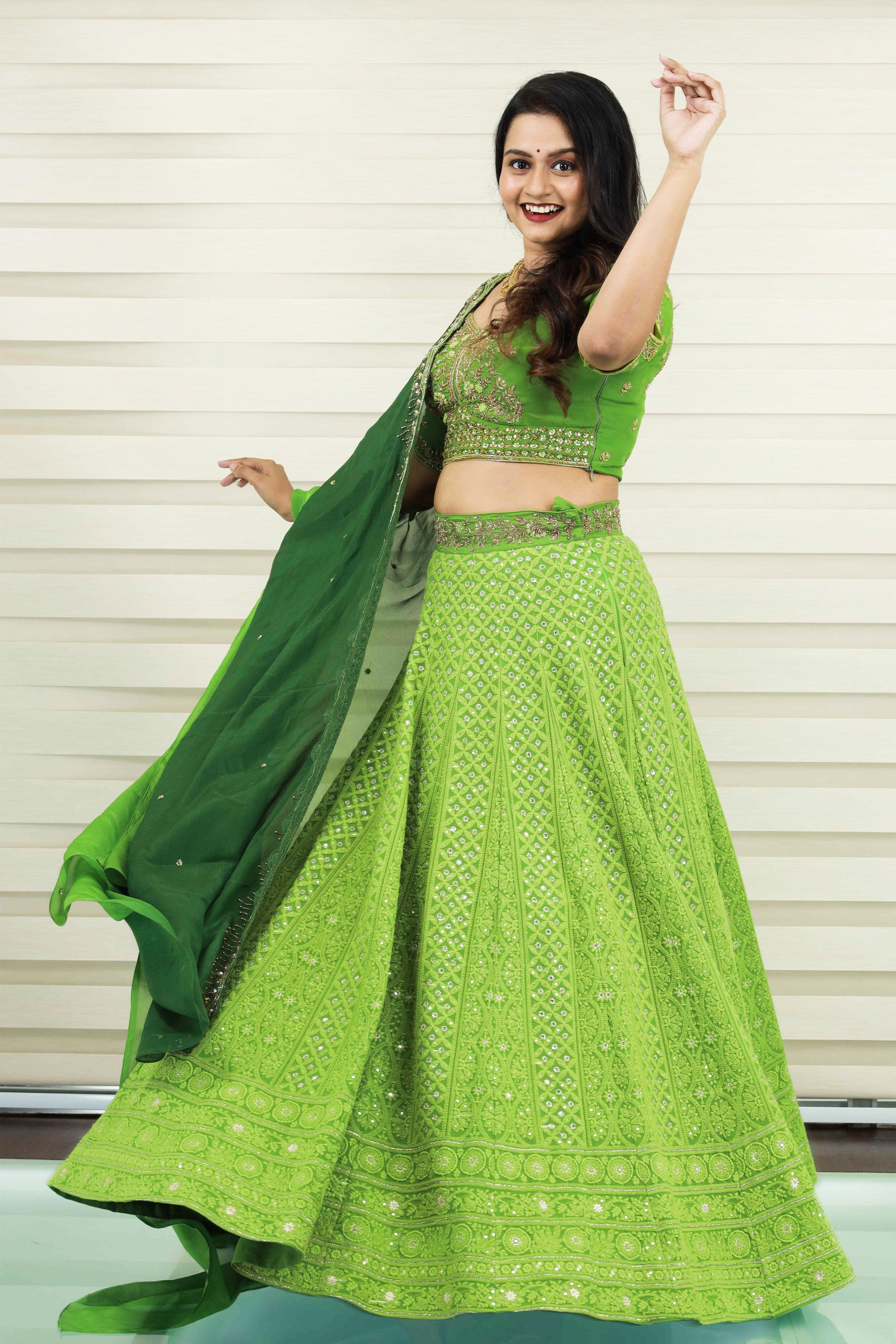 Sheen Green Bridal Lehenga detalied in Golden Zardozi Handwork & Thread Work