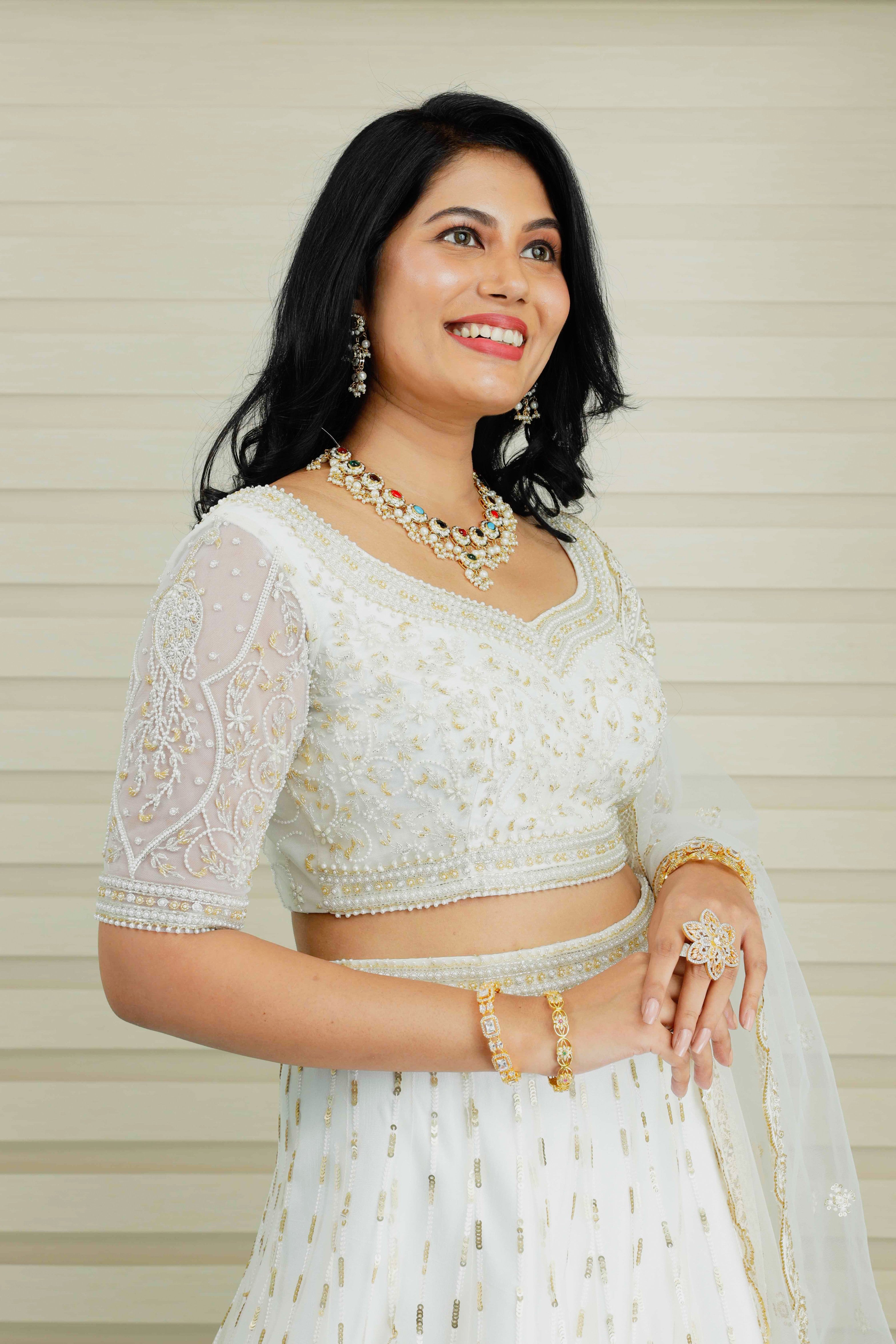 Ivory White Lehenga Detailed in Opal Pearls & Jaipuri Beads