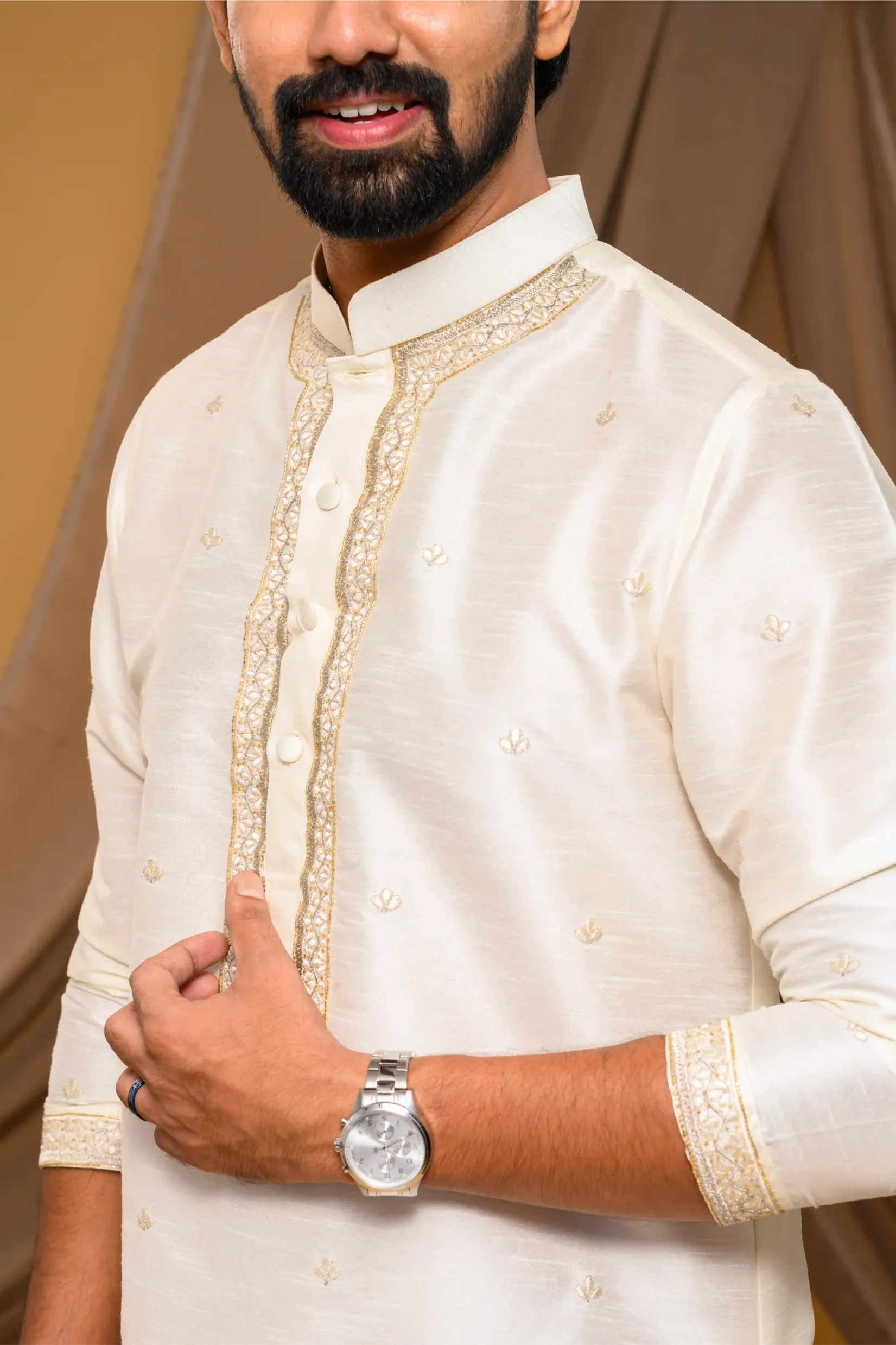 Off- White Silk Kurta with Hand Embroidery detailing  on placket, neck border & sleeve edge - floral body spread work  (Kurta Only)