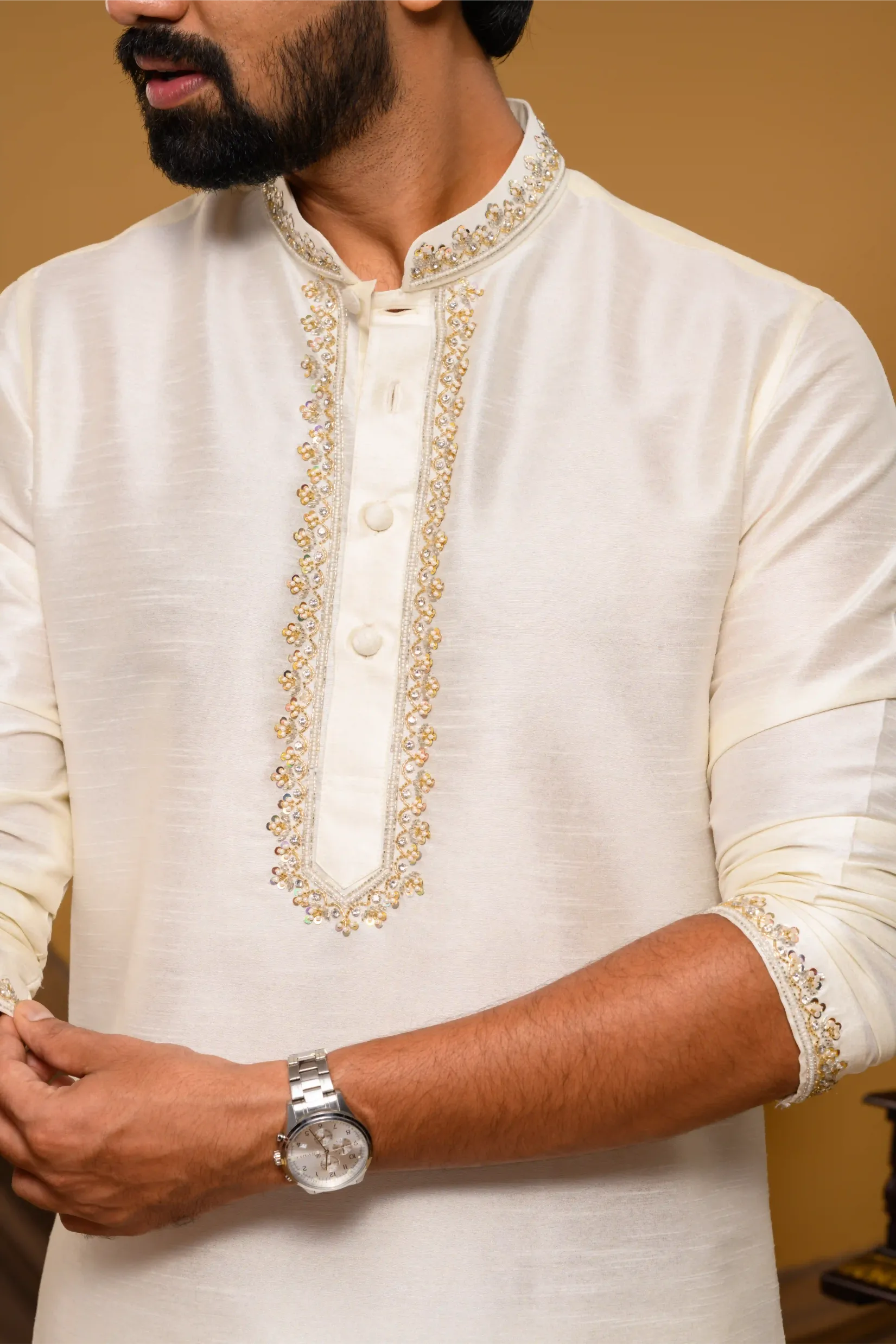 Off- White Silk Kurta with Hand Embroidery detailing  on Neck, placket edge & sleeve edge - floral body spread work  (Kurta Only)