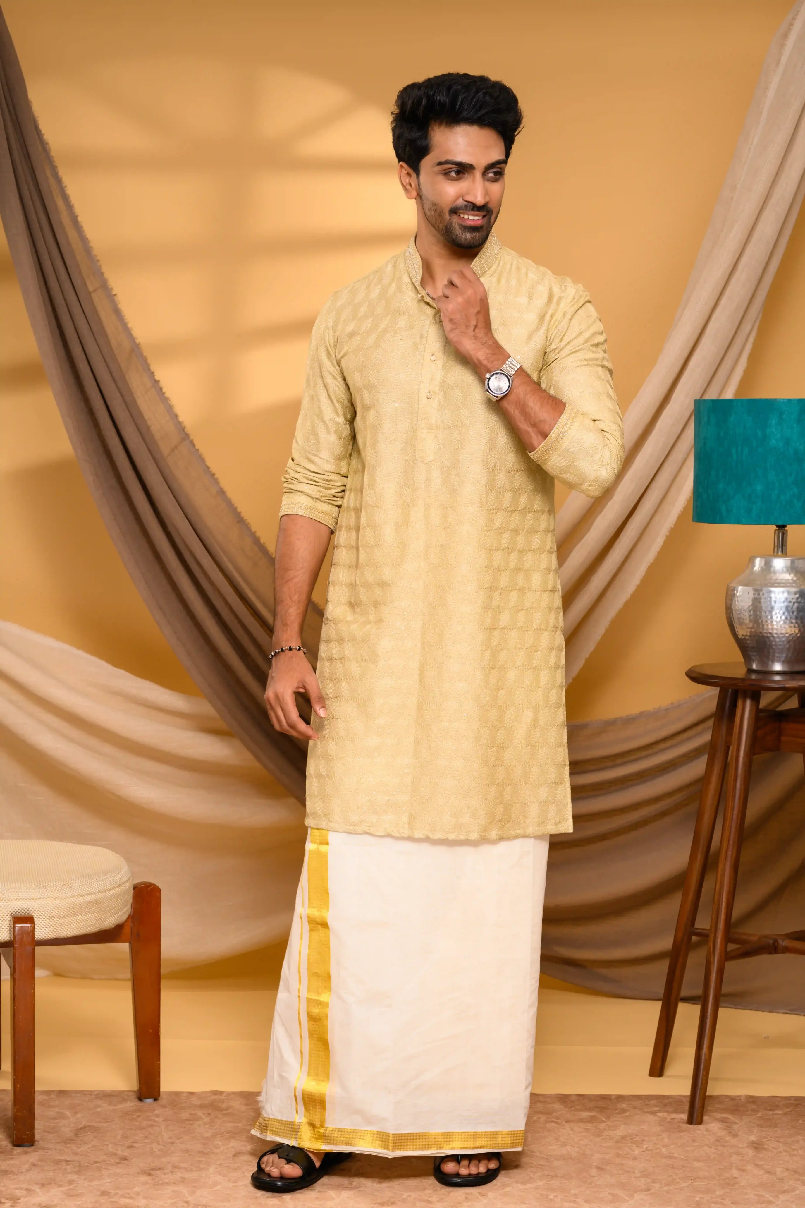 Golden Silk Kurta with all over Surface Embroidery   & Neck/Sleeve Zari Detailing (Kurta Only)