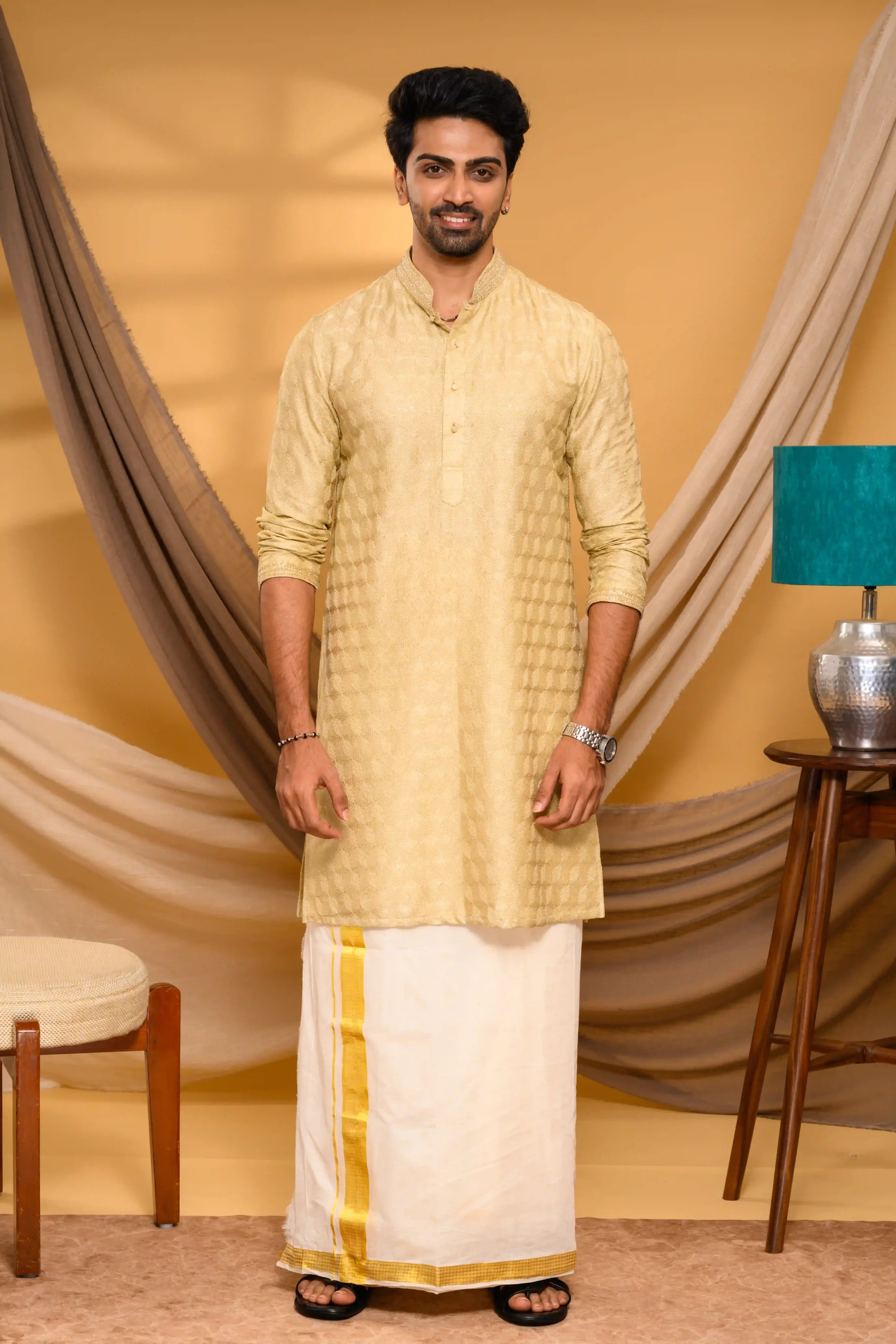Golden Silk Kurta with all over Surface Embroidery   & Neck/Sleeve Zari Detailing (Kurta Only)