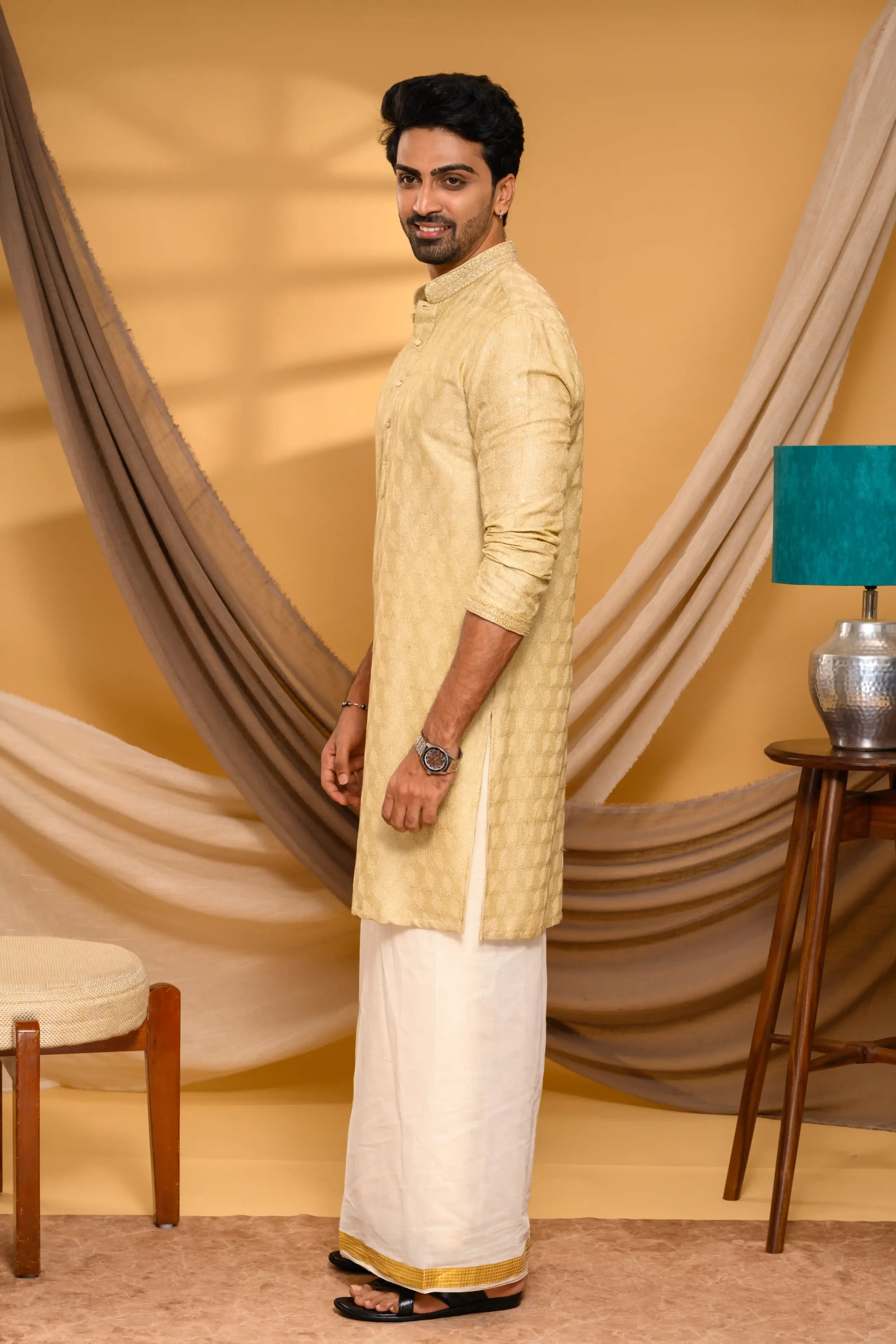 Golden Silk Kurta with all over Surface Embroidery   & Neck/Sleeve Zari Detailing (Kurta Only)