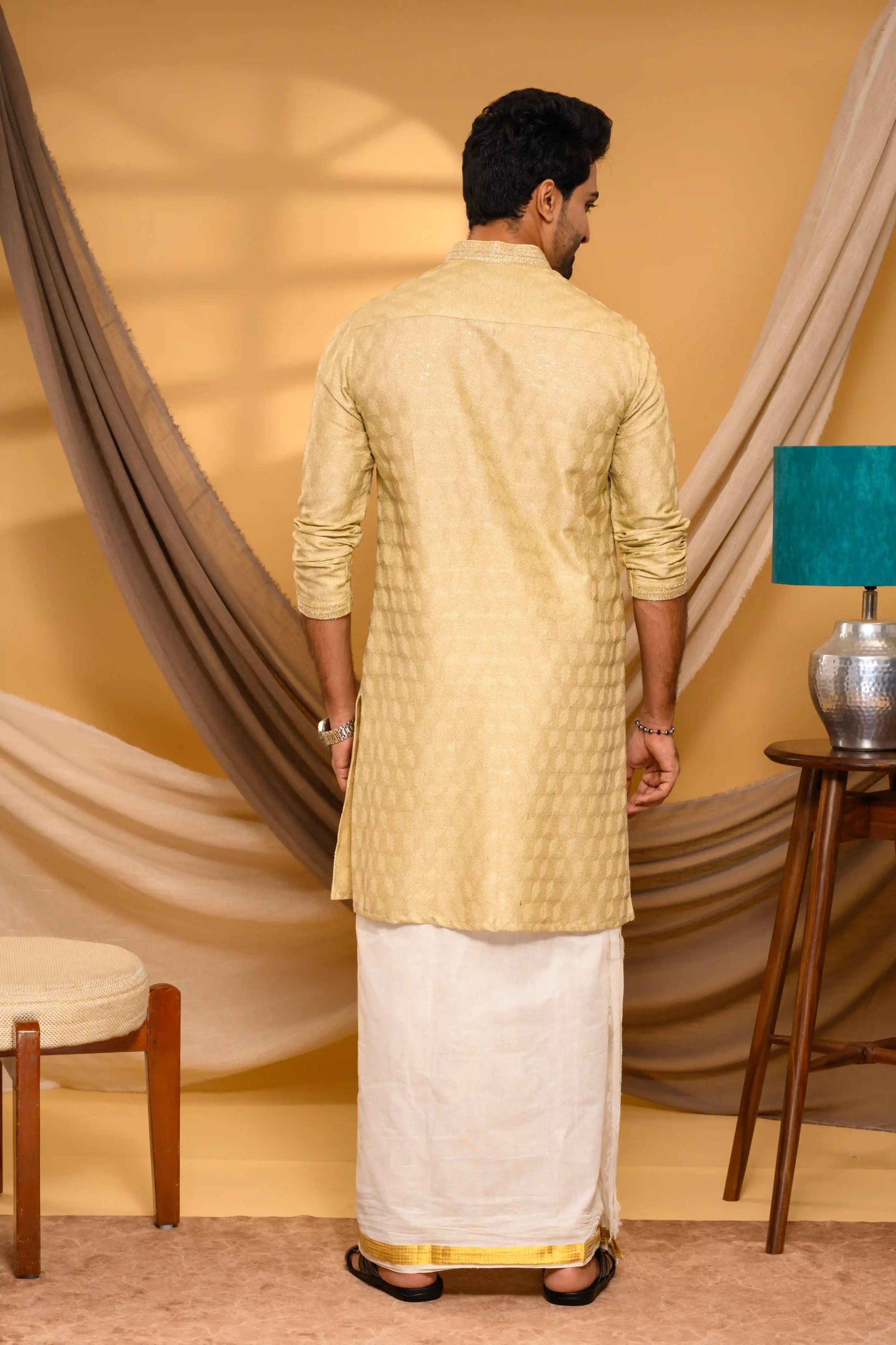 Golden Silk Kurta with all over Surface Embroidery   & Neck/Sleeve Zari Detailing (Kurta Only)