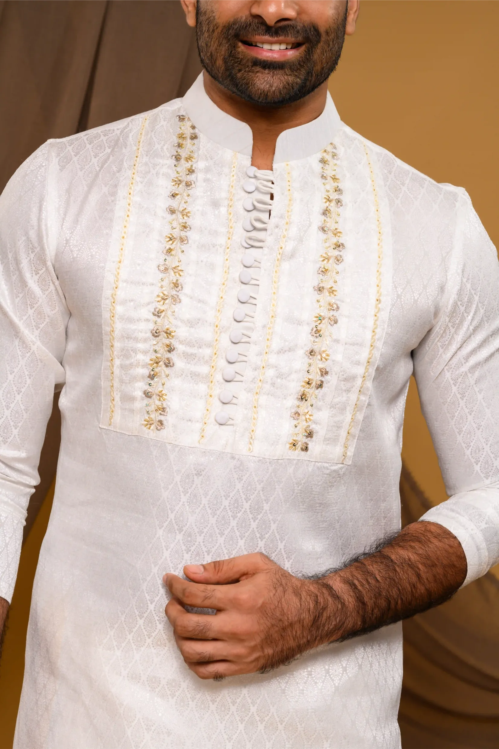 Ivory Silk Brocade Kurta with Heavy Golden Handwork detailing  on wide Placket Border(Kurta Only)