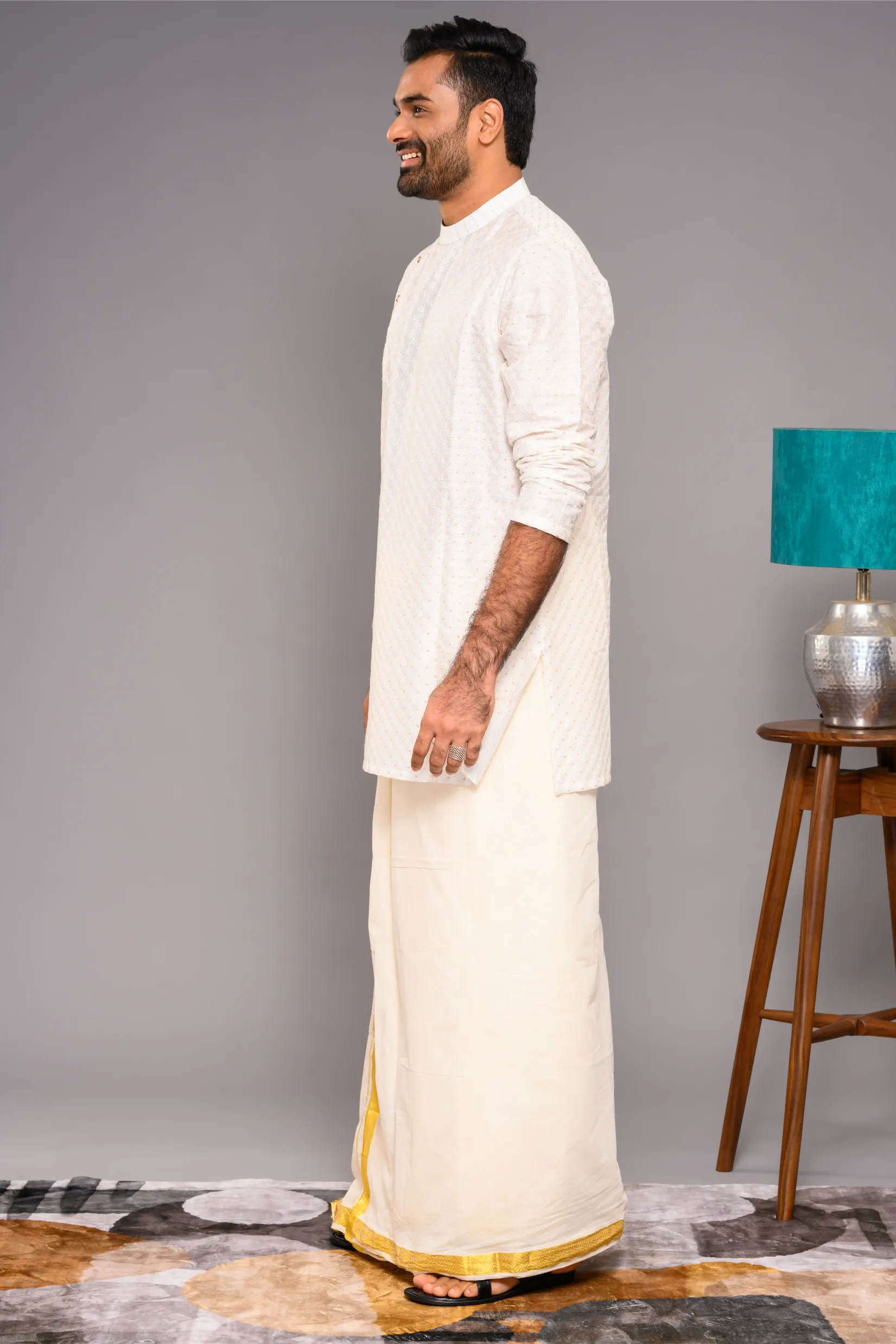 Classic Ivory Silk Kurta with side open closure opening with surface fabric embroidery (Kurta Only)