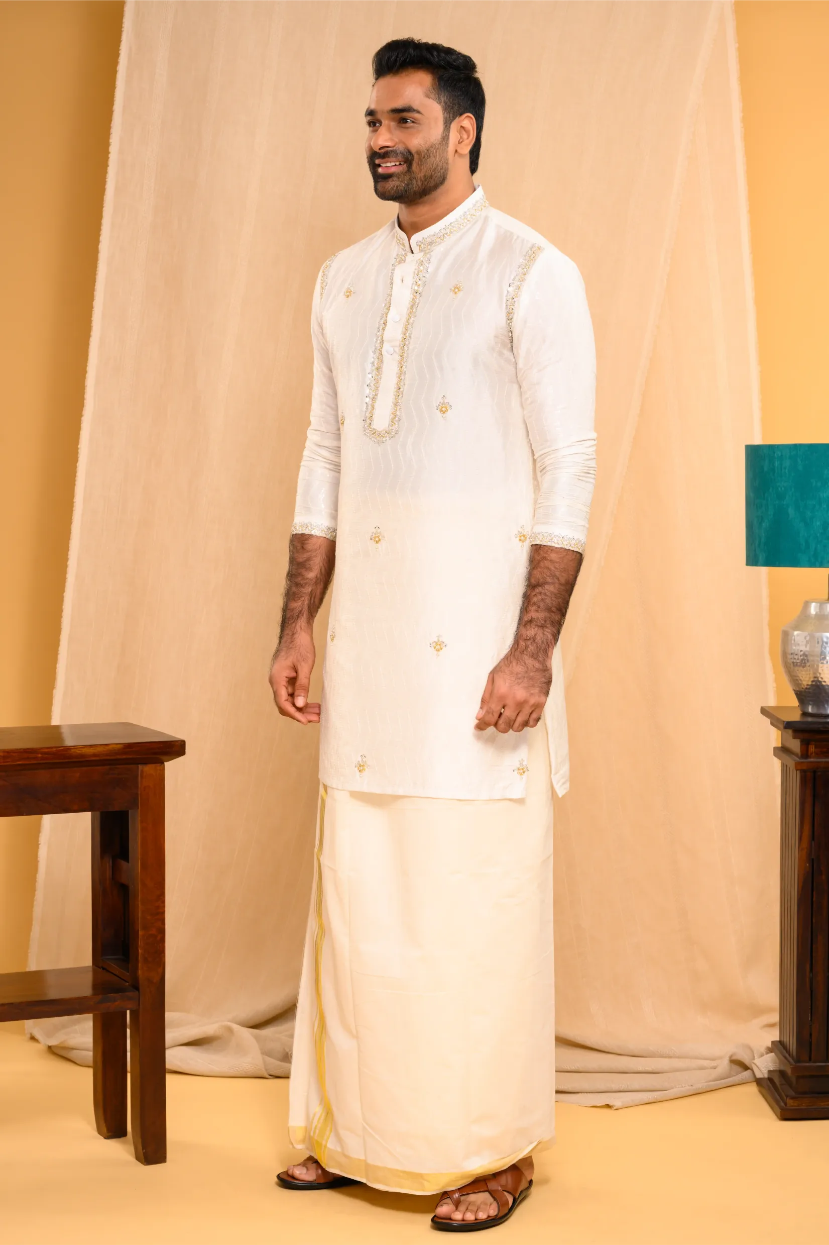 Ivory Silk Kurta  with floral embroidery detailing on Shoulder Lines, Sleeves Edge & Neck (Kurta Only)