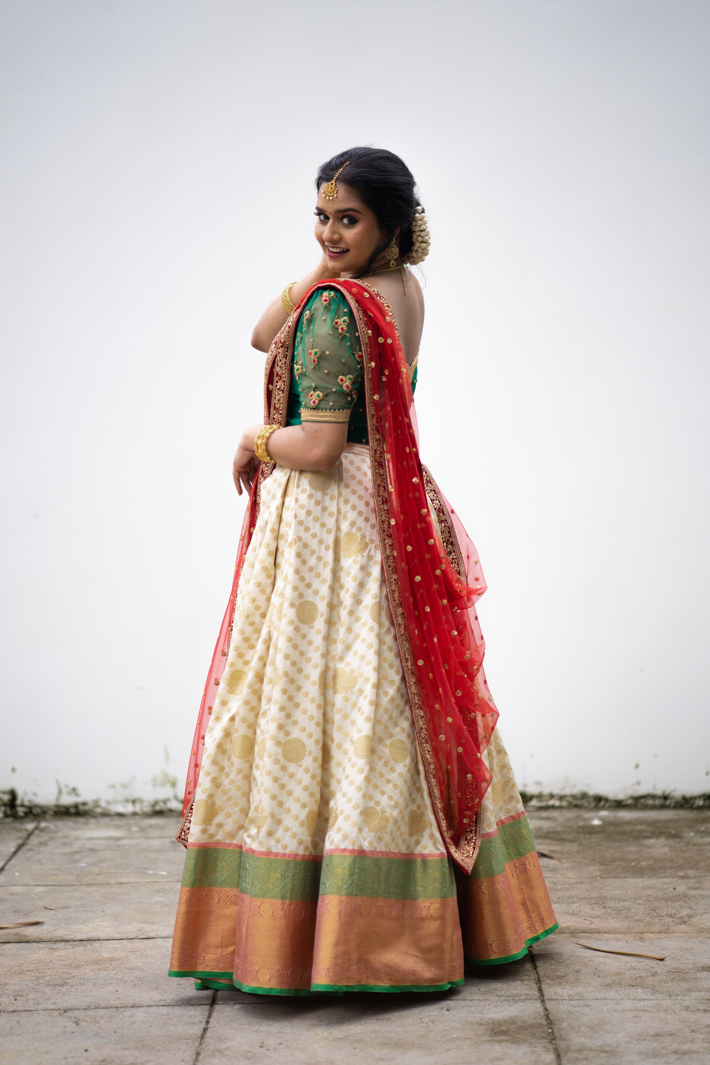 Cadmium Green/ Beige Traditional Lehenga Detailed Red & Gold hand Embroidery