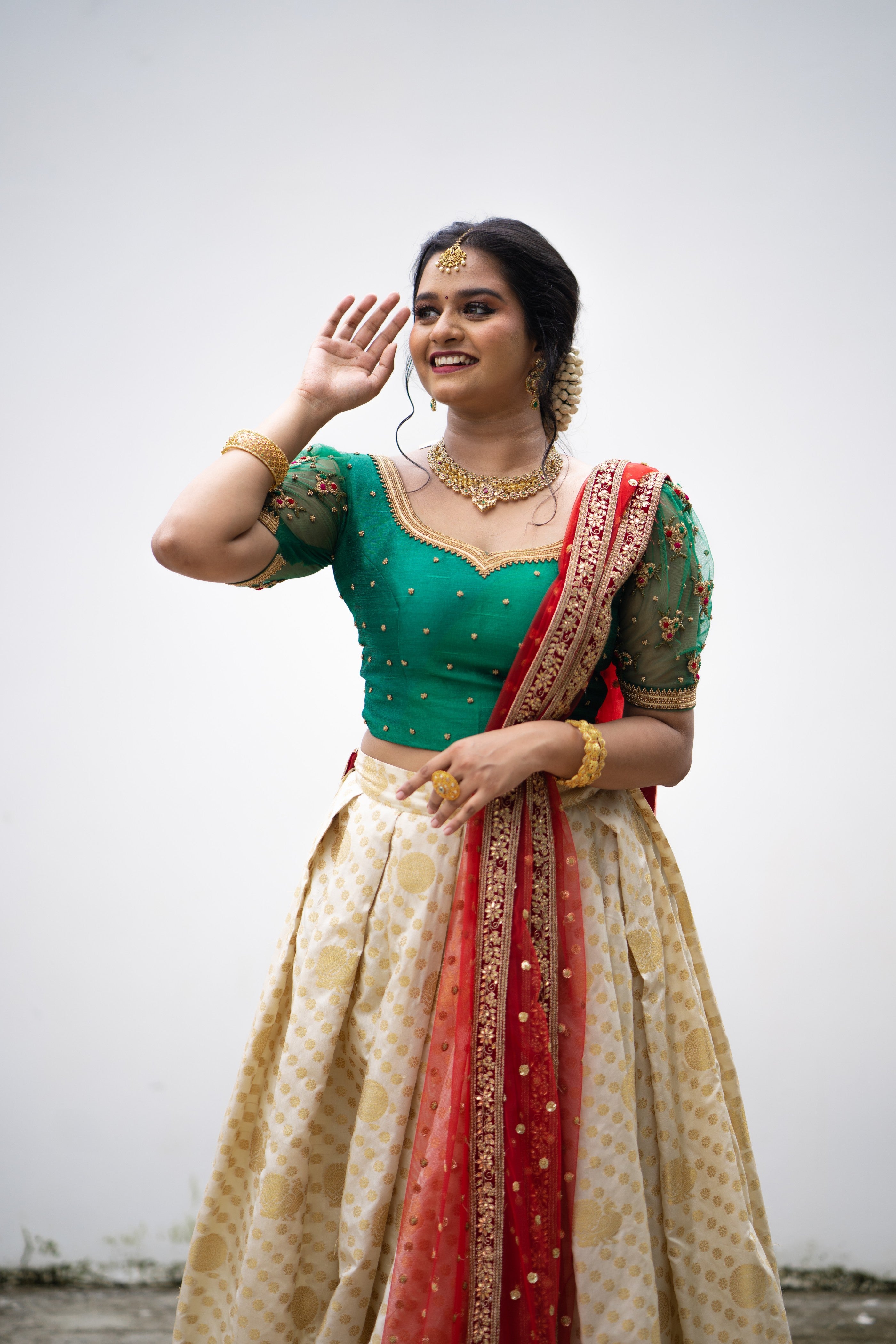 Cadmium Green/ Beige Traditional Lehenga Detailed Red & Gold hand Embroidery