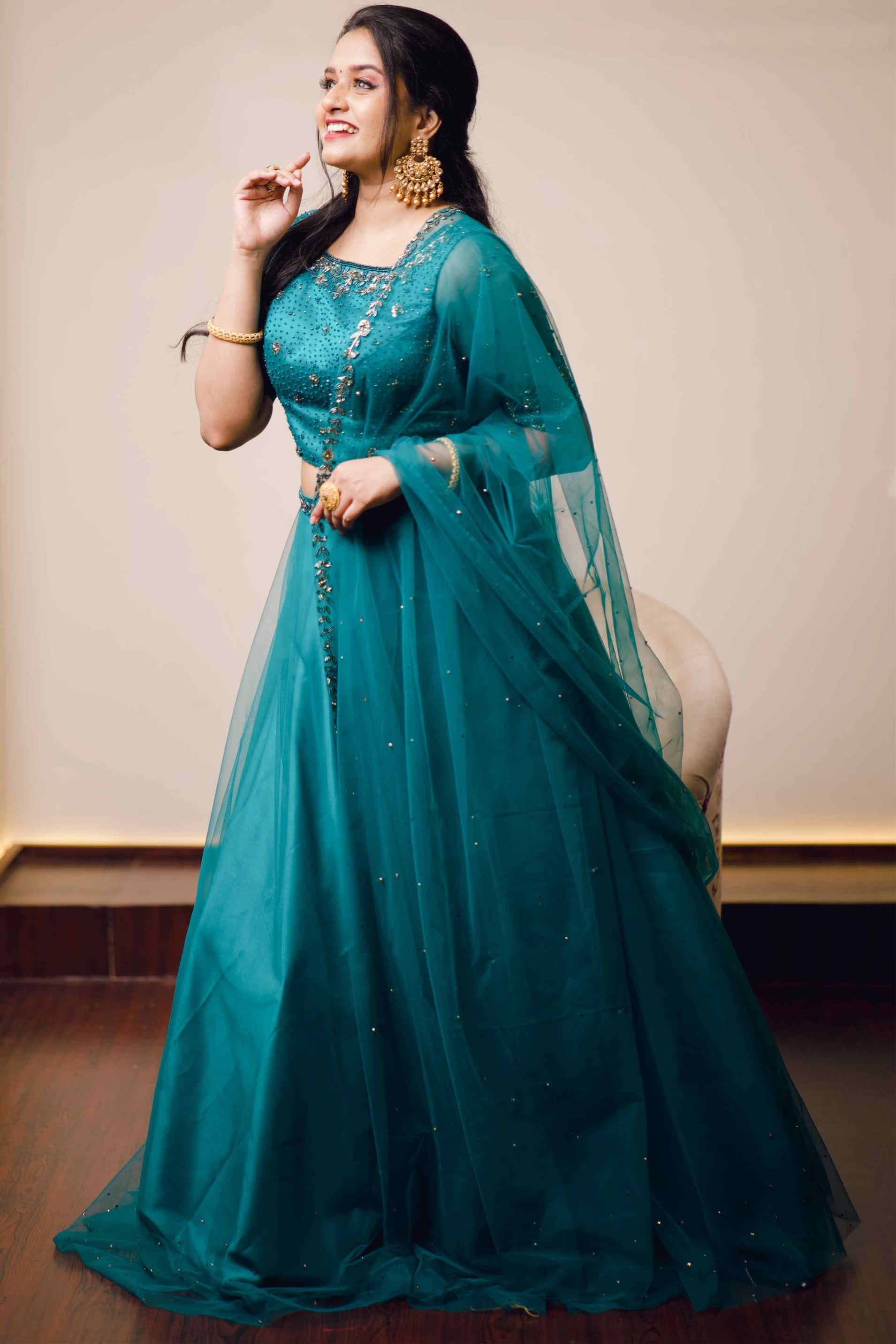 Teal Blue Lehenga Detailed with Antique Gold Embroidery