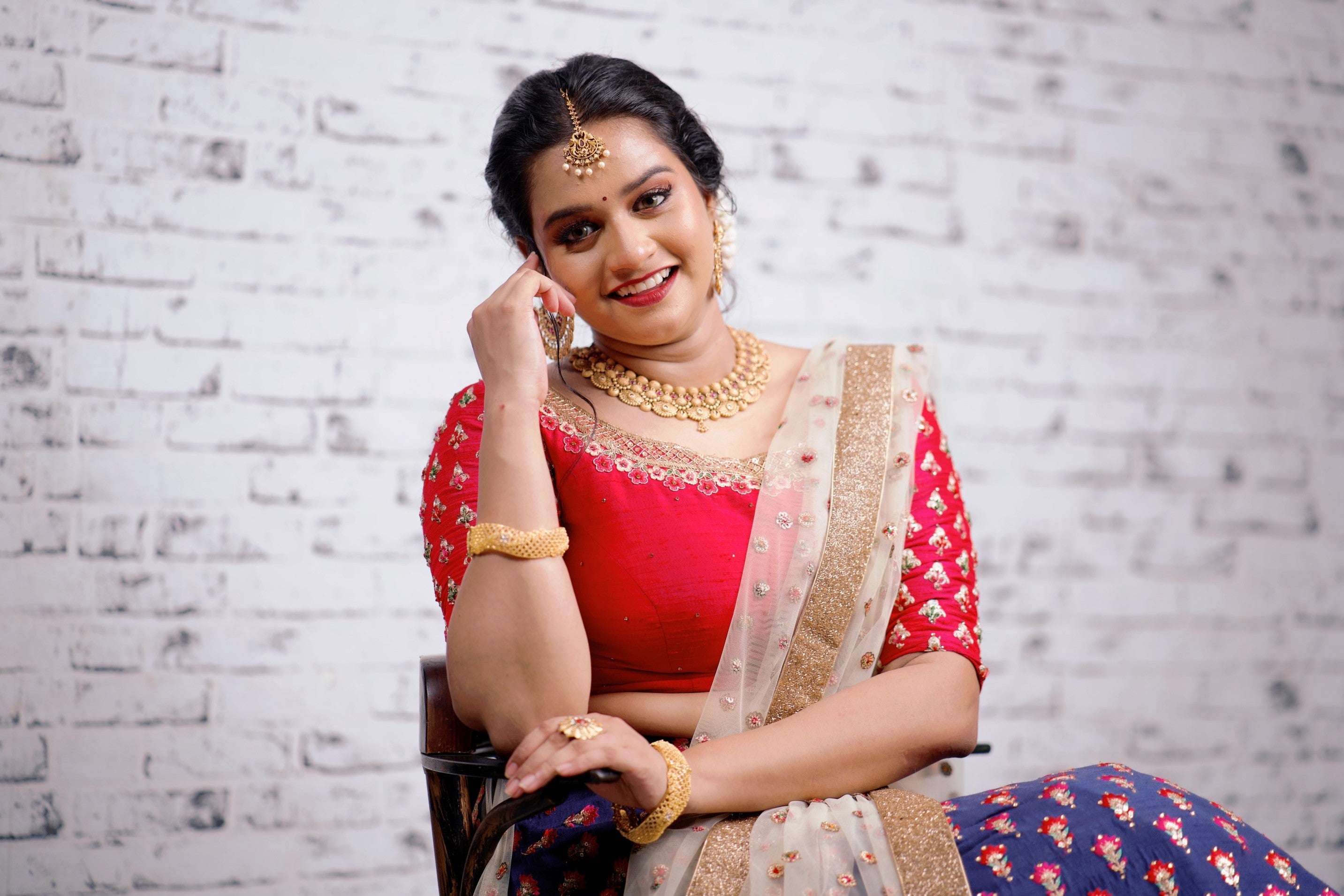 Red/ Blue Traditional Lehenga detailed with Golden Hand Embroidery