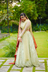 Pastel Green/ Red Bridal Lehenga Detailed with Light Gold Embroidery