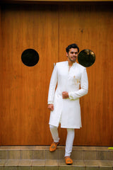 Off White Brocade Indo Western Slim Achkan Suit  paired with White Kurta & White Narrow Pants