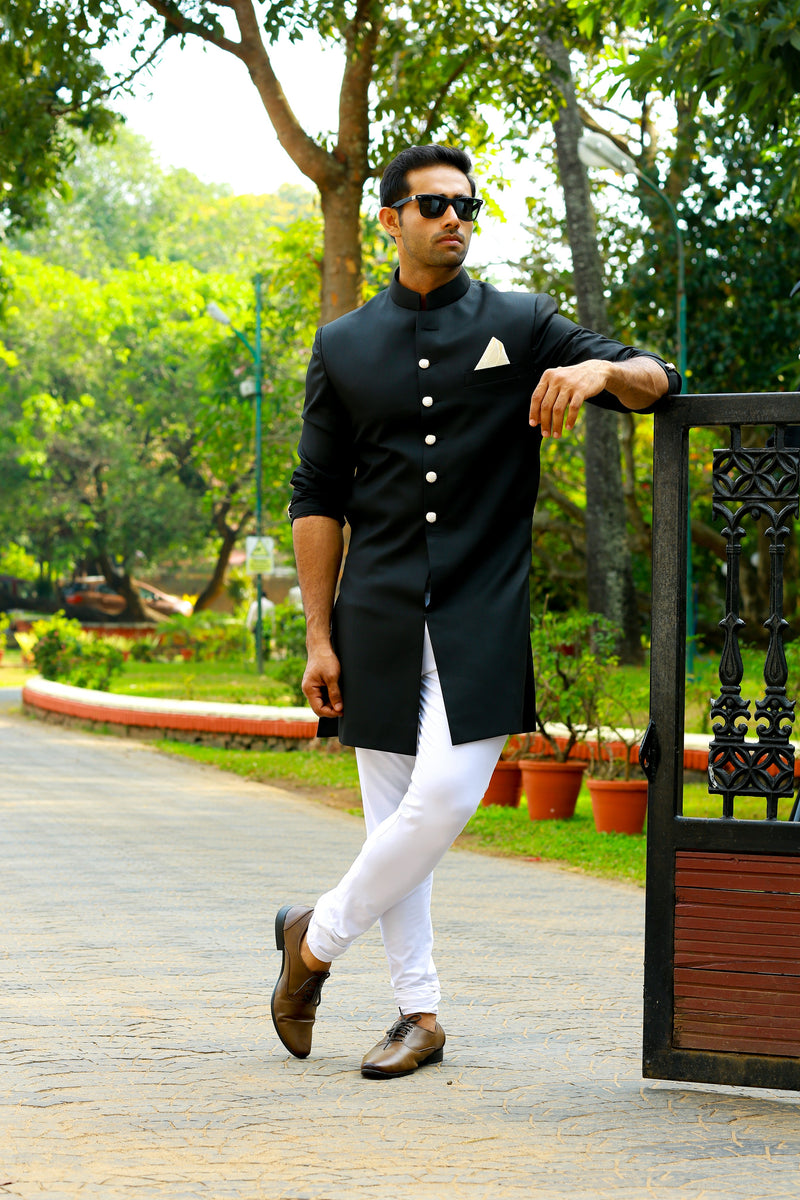 Jet Black Indo Western Slim Achkan Suit  paired with White Narrow Pants