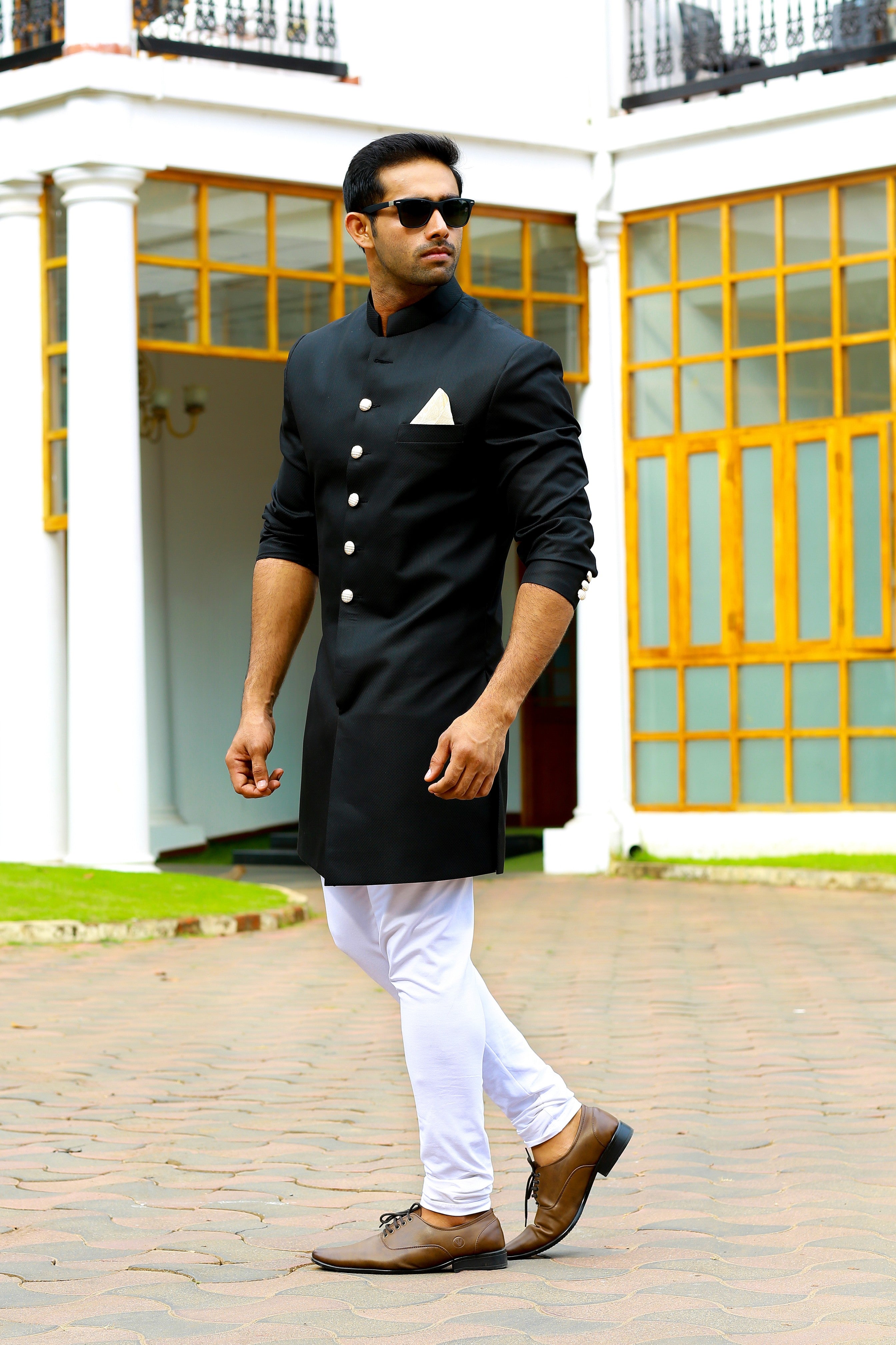 Jet Black Indo Western Slim Achkan Suit  paired with White Narrow Pants