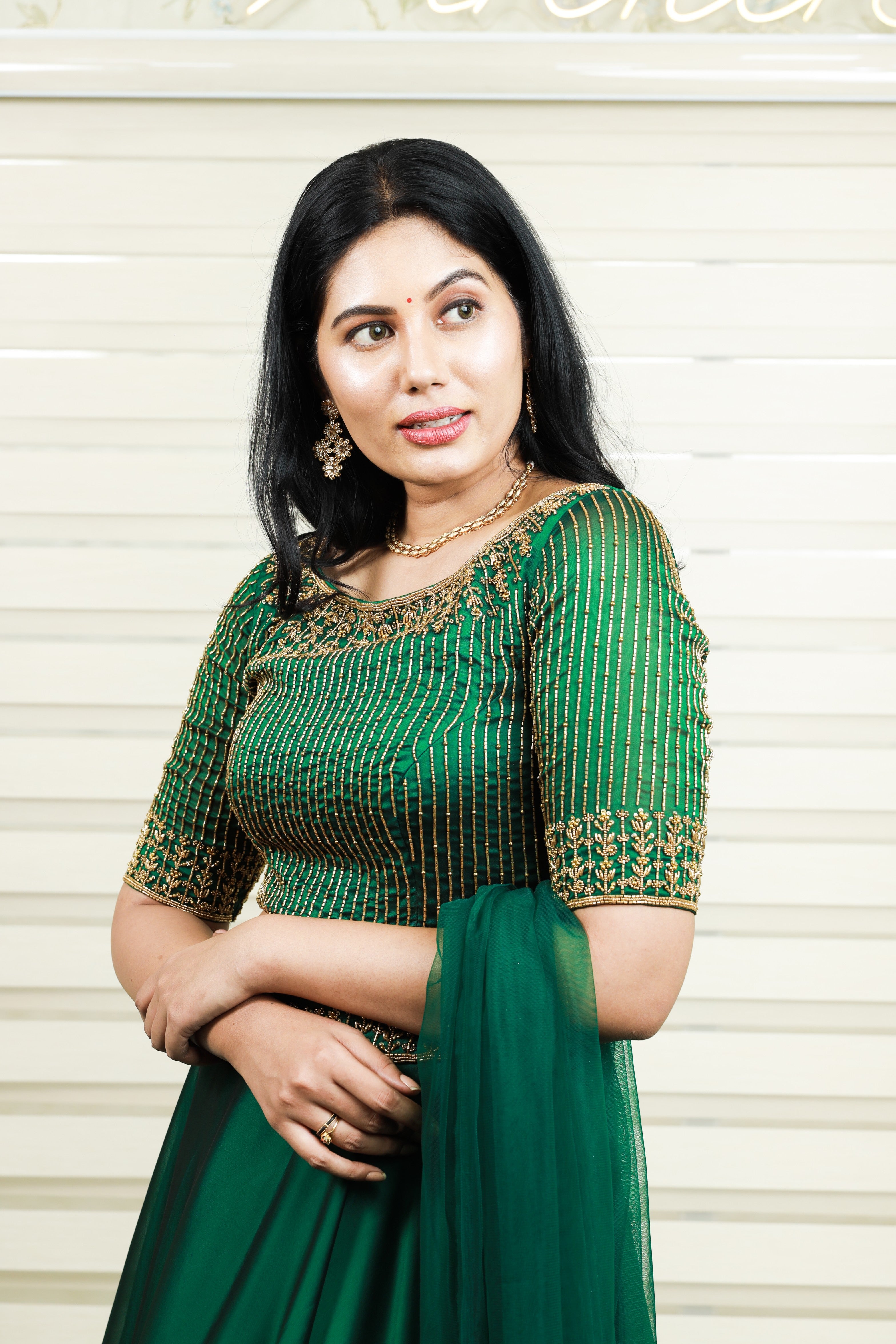 Dark Green Boat Neck Lehenga Detailed with Golden Bead Embroidery
